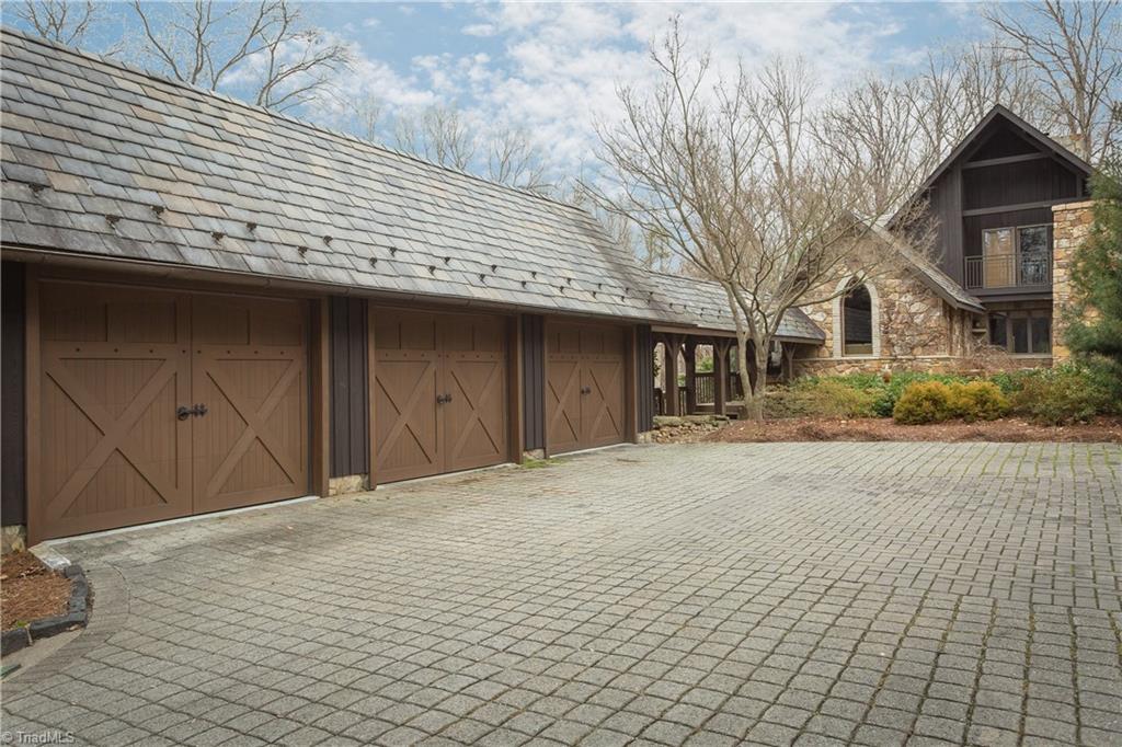 6111 Meadow Bluff Lane Oak Ridge, NC 27310 - Photo 26 of 30 Entrance to the side the house.