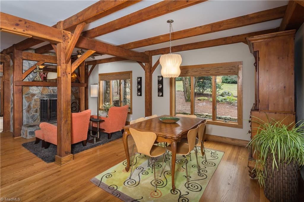 6111 Meadow Bluff Lane Oak Ridge, NC 27310 - Photo 10 of 30 The dining area is directly next to the kitchen. This wing of the house is open and perfect for entertaining.