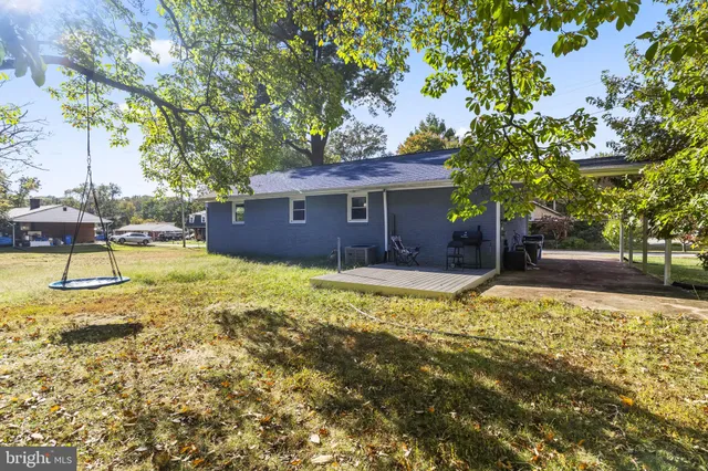 a view of a house with swimming pool