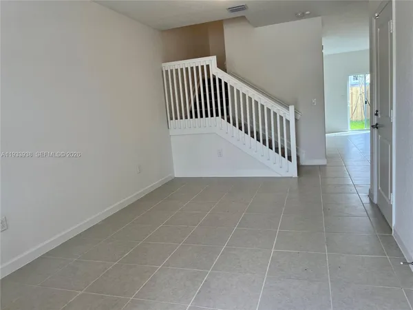 a view of a hallway with entryway