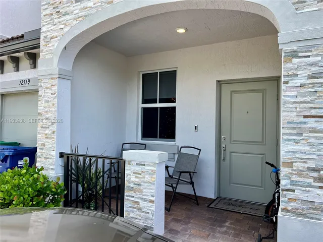 a view of a hallway with entryway