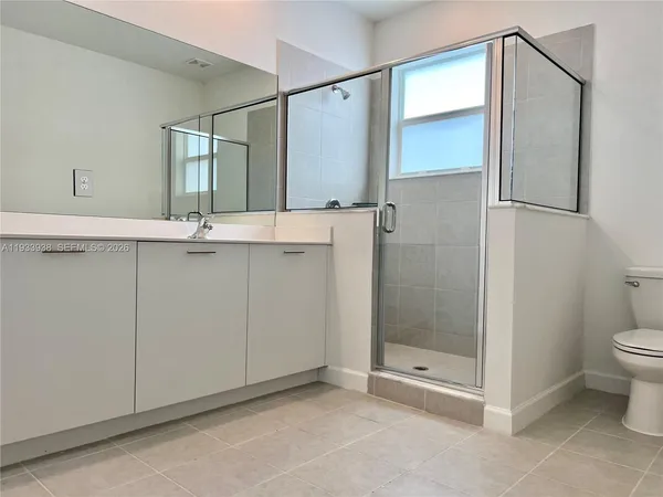an empty room with closet area