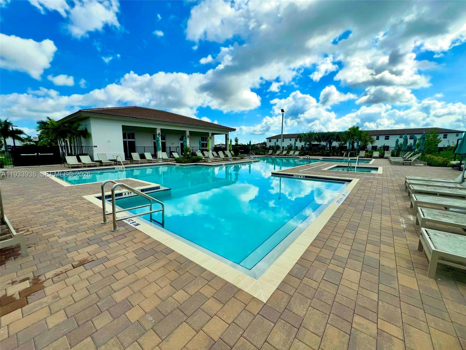 12713 Northwest 24th Avenue Miami, FL 33147 - Photo 41 of 50 a view of a house with swimming pool and sitting area