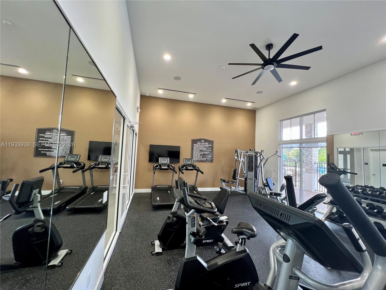 12713 Northwest 24th Avenue Miami, FL 33147 - Photo 43 of 50 a view of a room with gym equipment