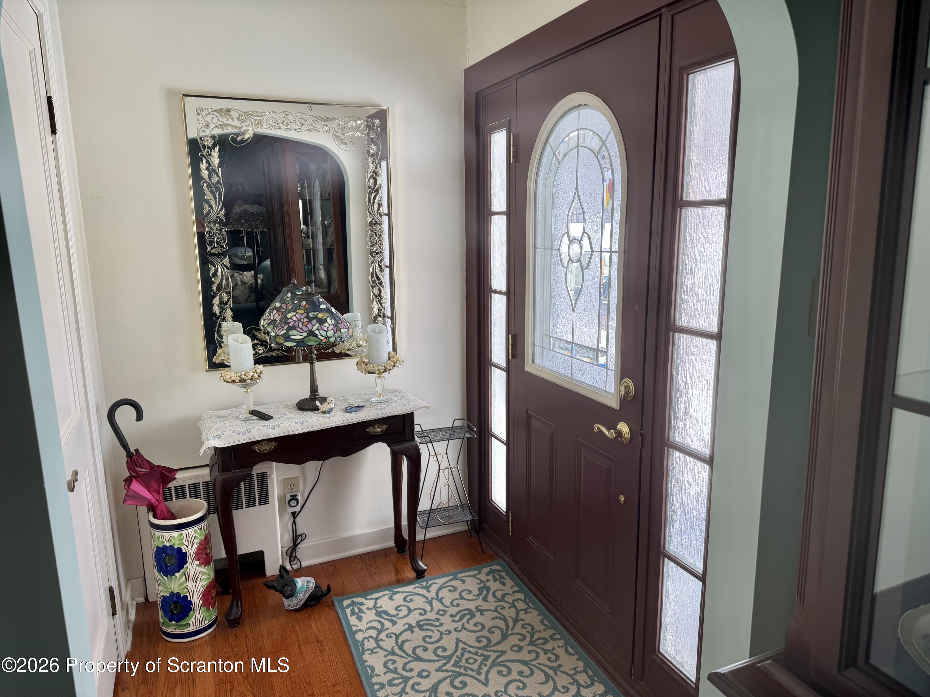 1203 Froude Avenue Scranton, PA 18505 - Photo 5 of 24 a view of hall way with mirror and furniture