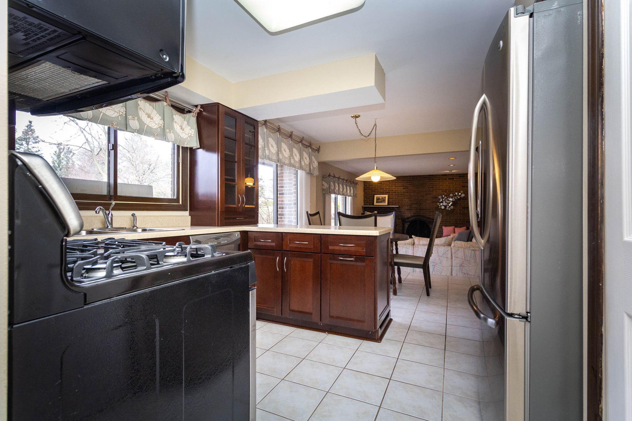 22175 Wingate Court Farmington, MI 48335 - Photo 19 of 44 Newer cabinets and tile