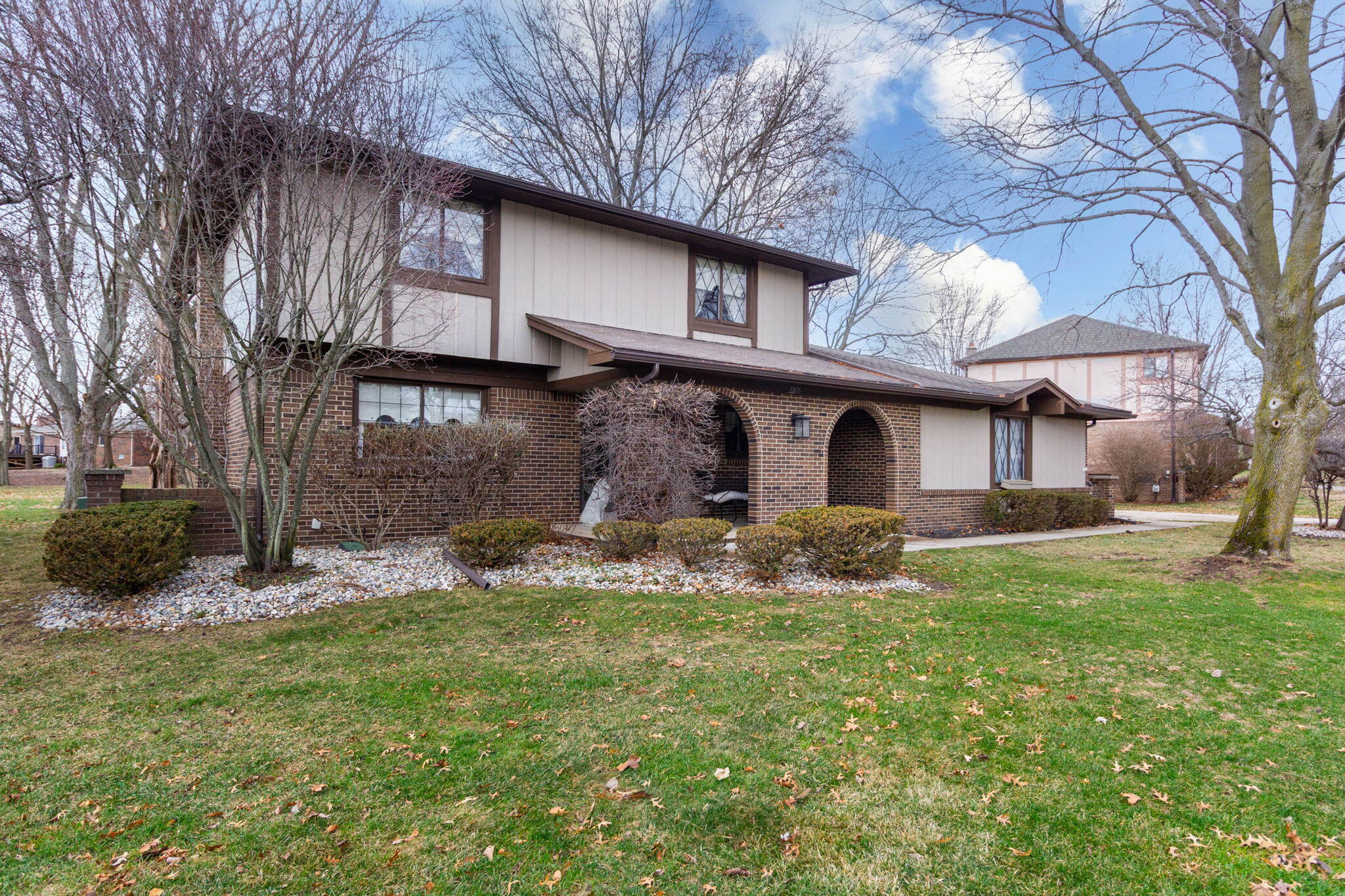 22175 Wingate Court Farmington, MI 48335 - Photo 3 of 44 Brick and wood exterior