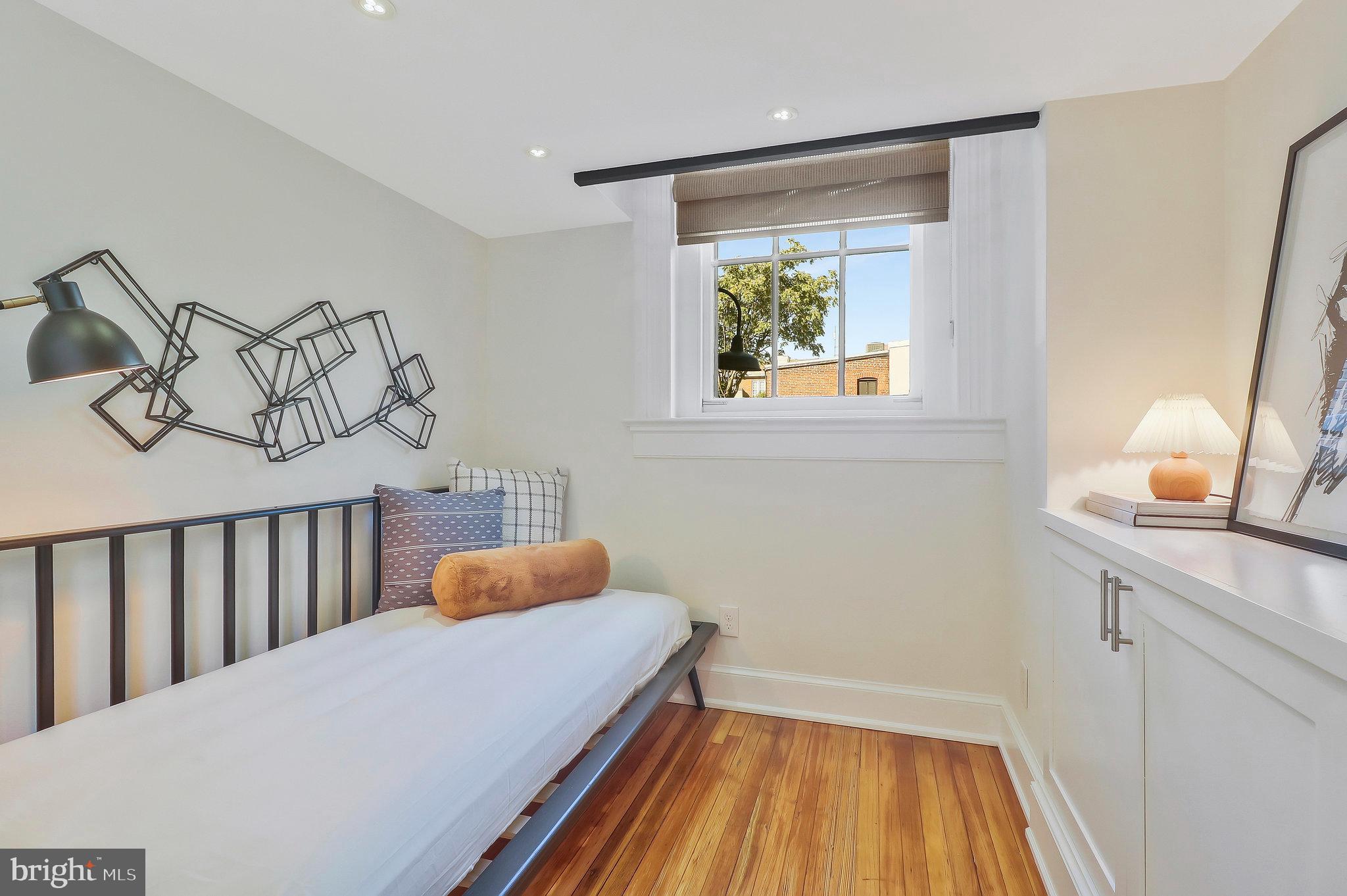 410 5th Street Northeast, Unit 14 Washington, DC 20002 - Photo 11 of 40 Main level BR with lofted window.