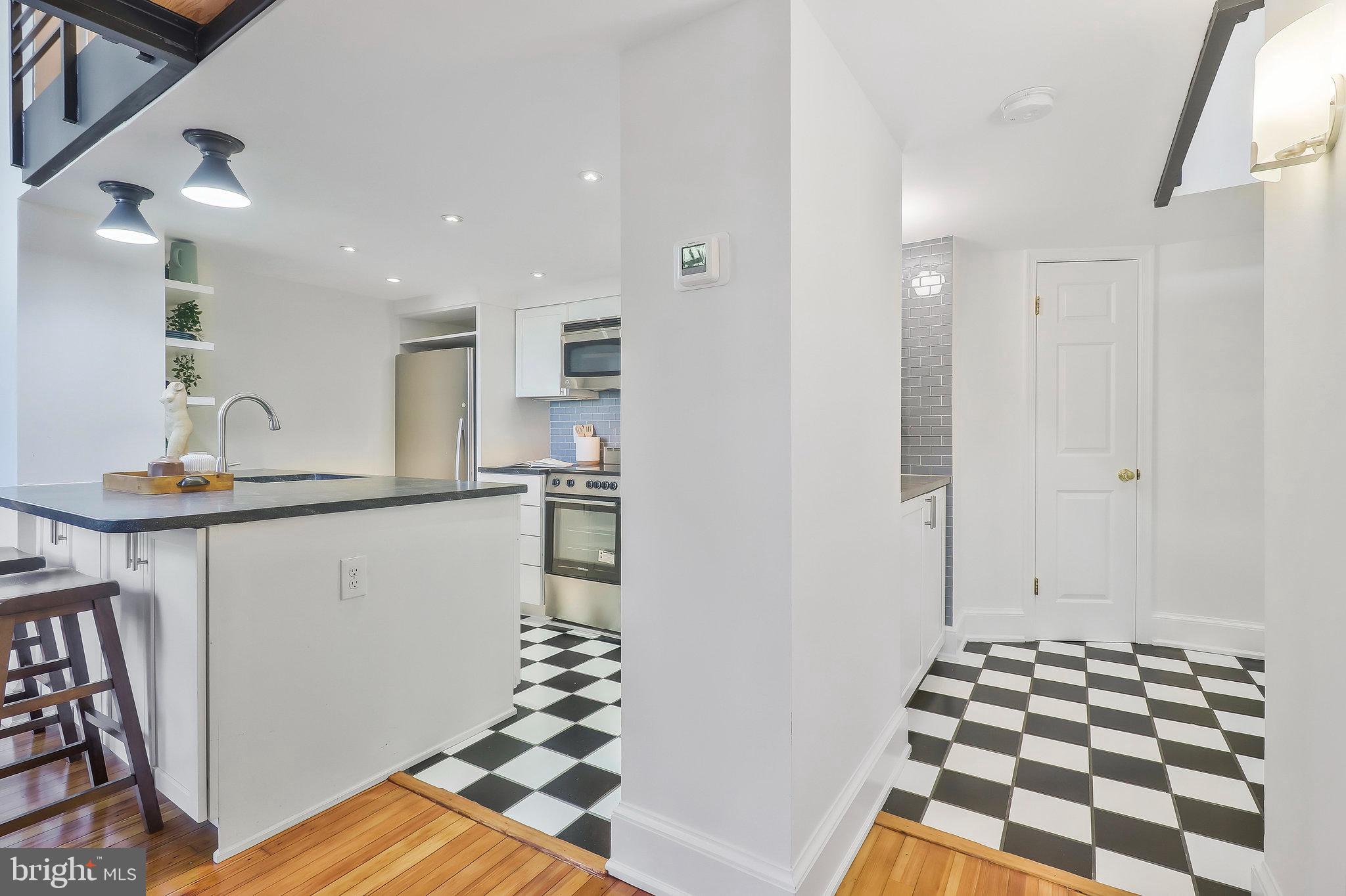 410 5th Street Northeast, Unit 14 Washington, DC 20002 - Photo 14 of 40 Entry hall and open kitchen.