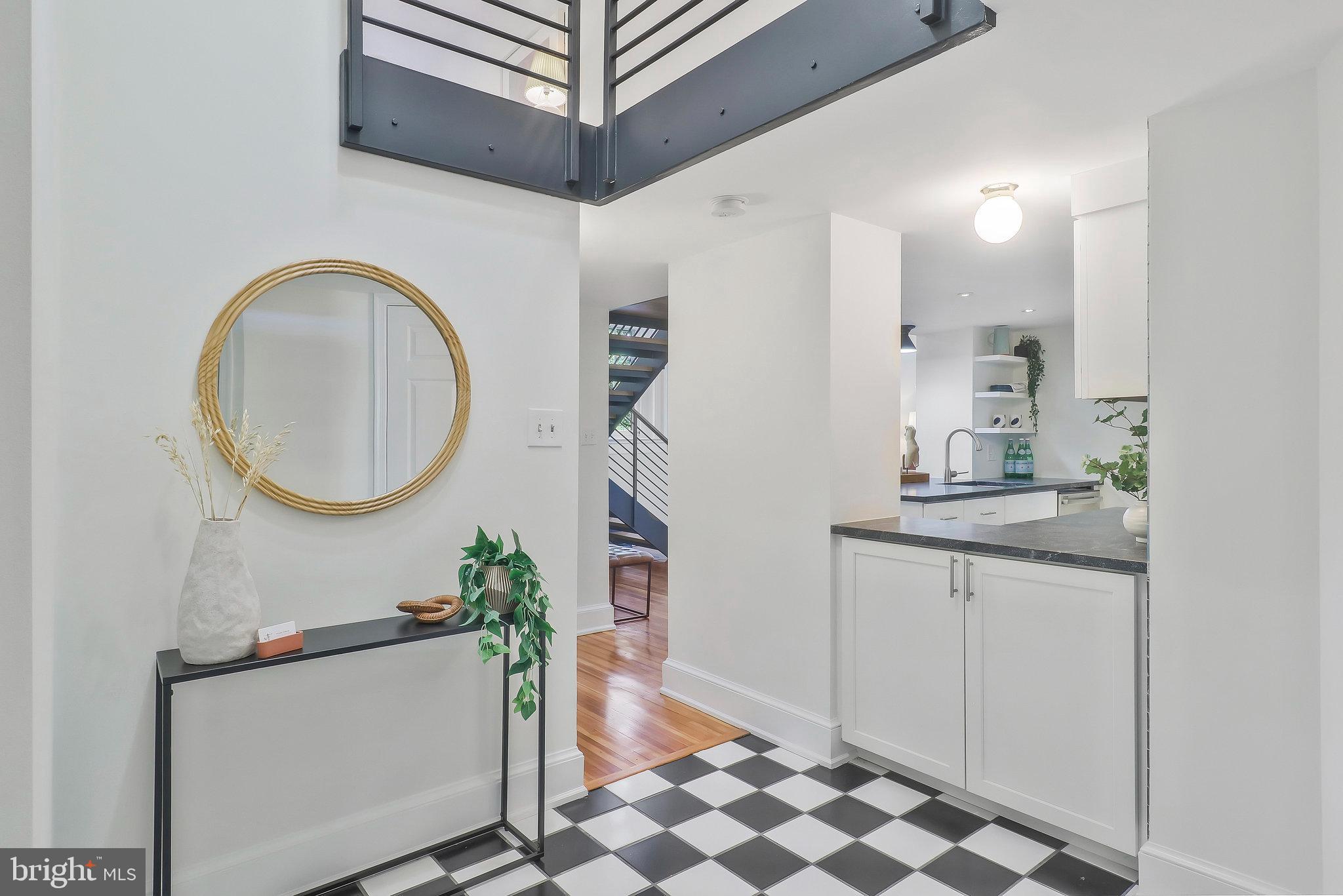 410 5th Street Northeast, Unit 14 Washington, DC 20002 - Photo 9 of 40 Entry hall opens into kitchen/DR/LR.