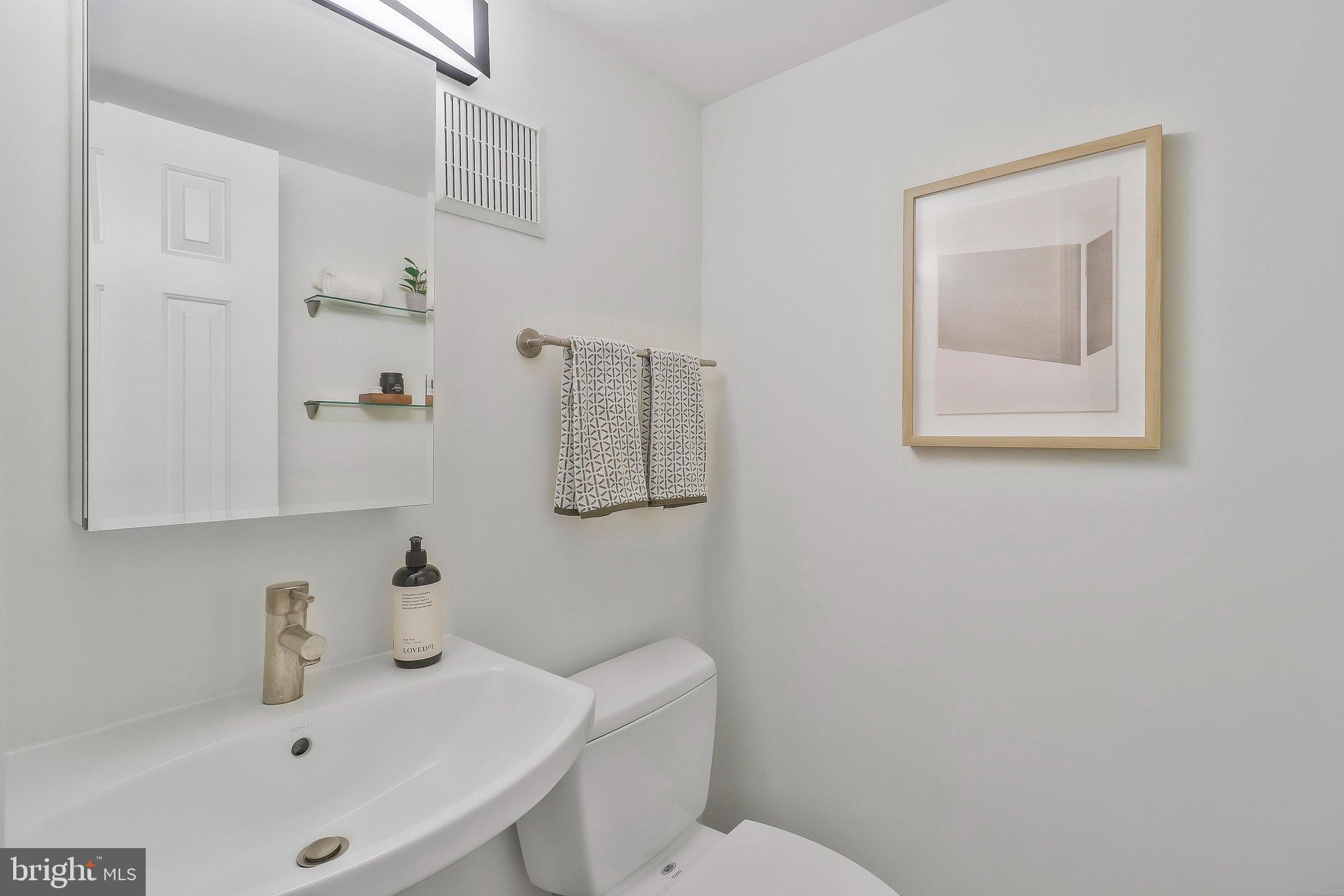 410 5th Street Northeast, Unit 14 Washington, DC 20002 - Photo 10 of 40 Main level powder room.