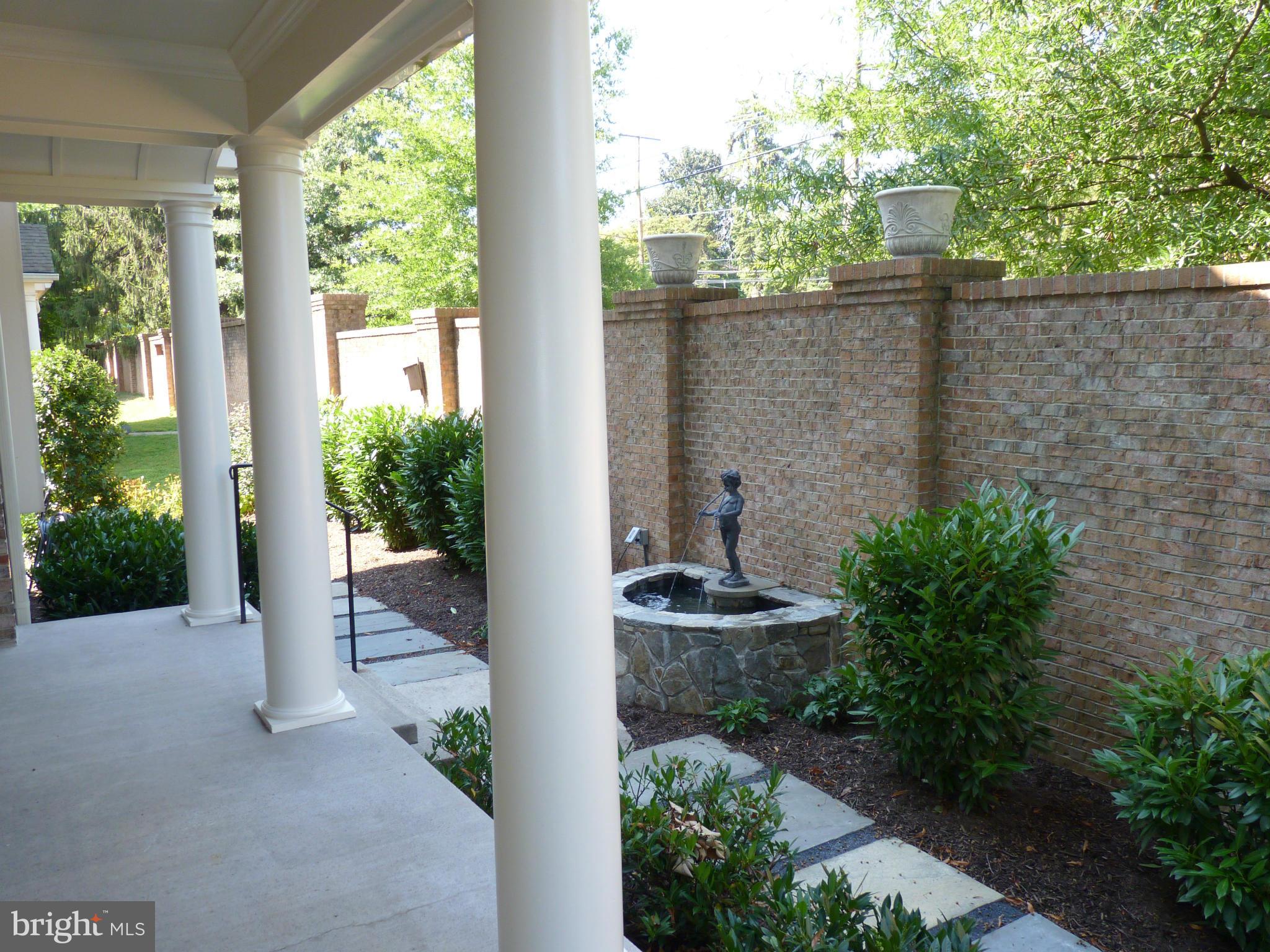 831 Woodside Parkway Silver Spring, MD 20910 - Photo 13 of 30 a view of a garden with patio