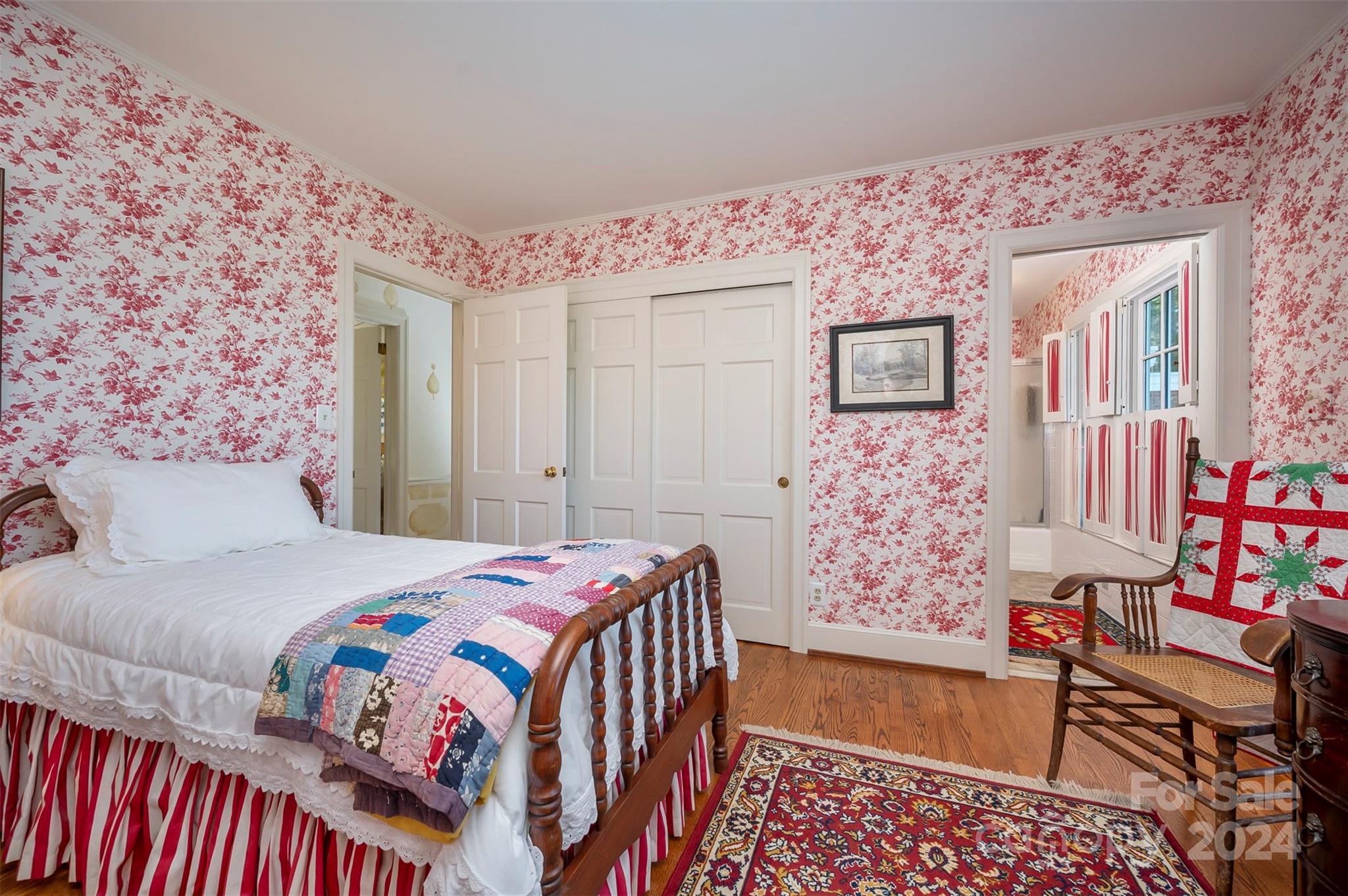 720 New Hope Road Rutherfordton, NC 28139 - Photo 23 of 44 a bedroom with a bed and wooden floor