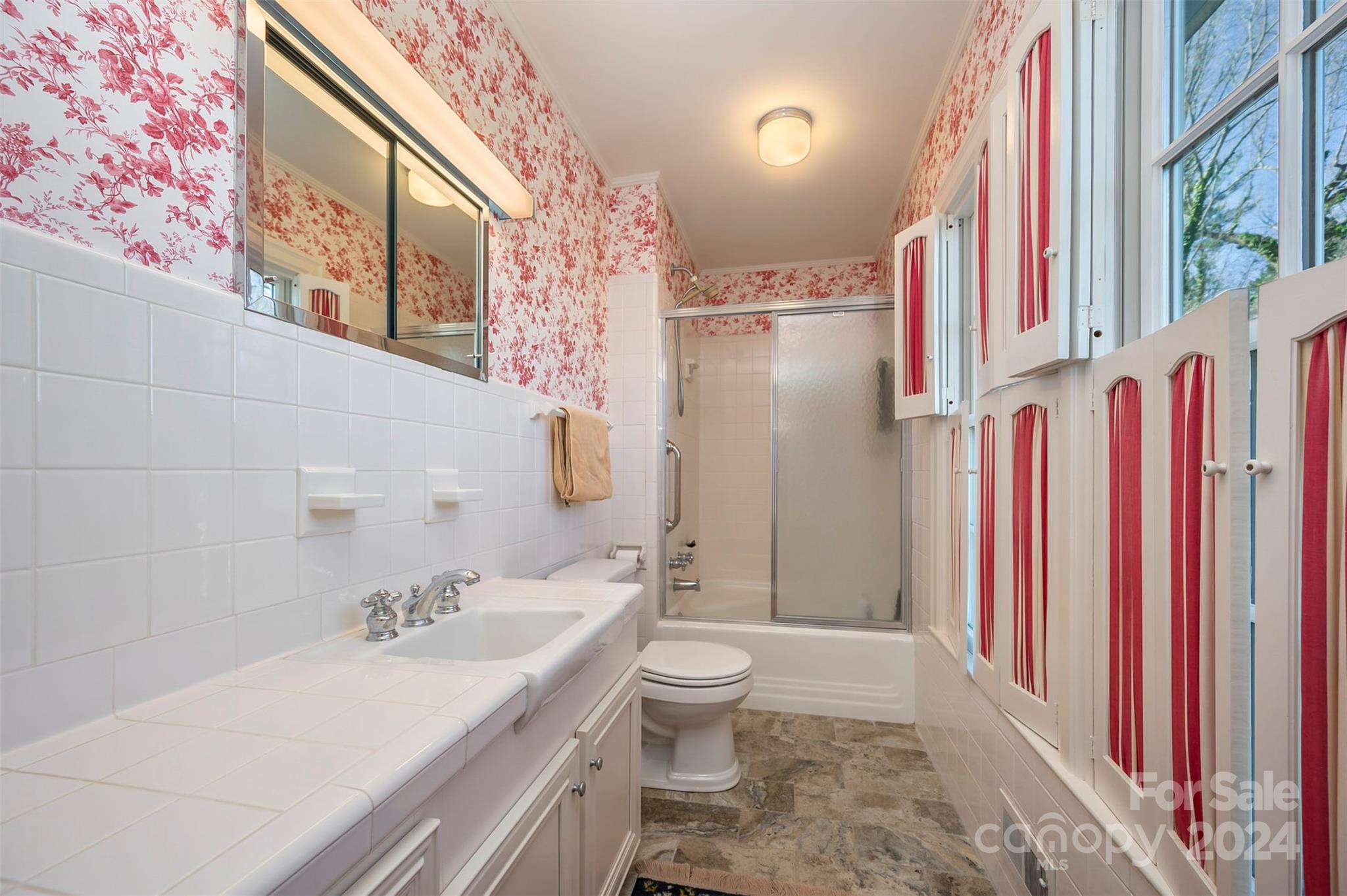 720 New Hope Road Rutherfordton, NC 28139 - Photo 24 of 44 a bathroom with a sink a toilet and shower curtain