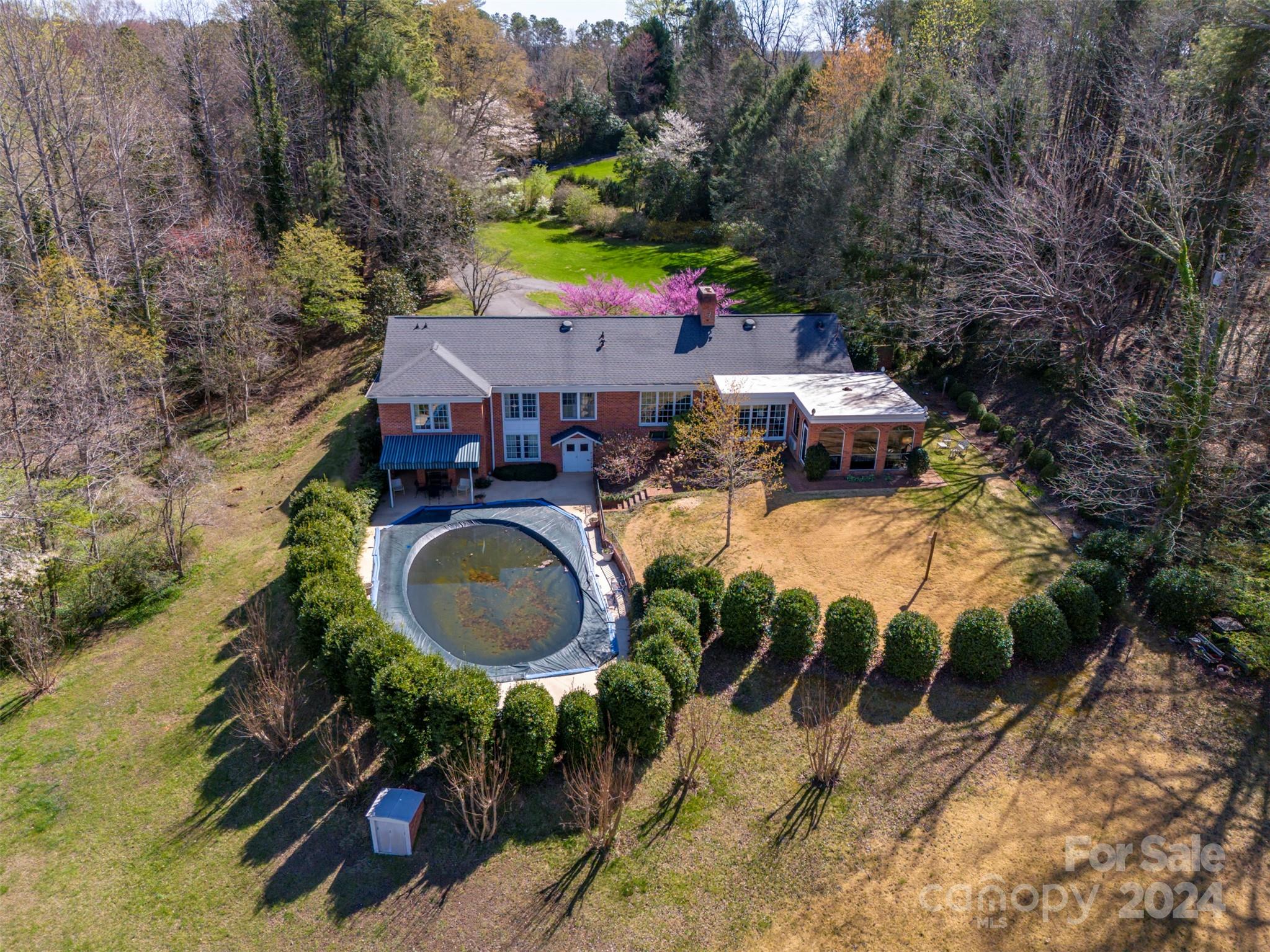 720 New Hope Road Rutherfordton, NC 28139 - Photo 38 of 44 an aerial view of a house with garden space and street view