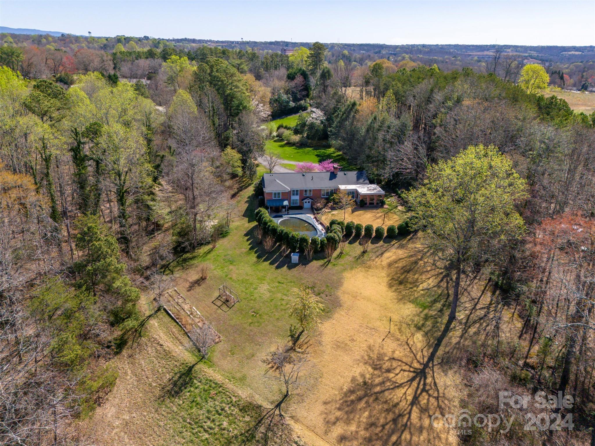 720 New Hope Road Rutherfordton, NC 28139 - Photo 40 of 44 a aerial view of a house with a lake view