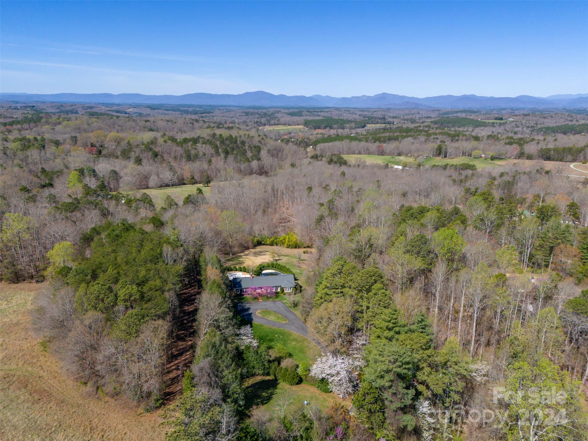 720 New Hope Road Rutherfordton, NC 28139 - Photo 41 of 44 a view of a city with lush green forest