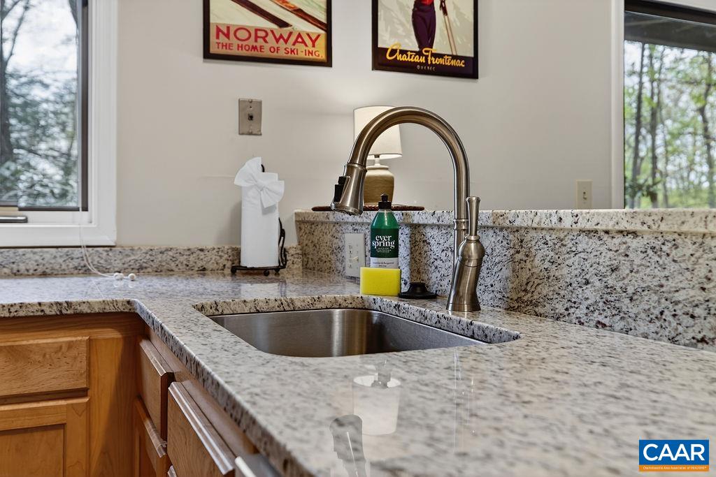 410 Three Ridges Roseland, VA 22967 - Photo 16 of 21 a kitchen with a sink and a stove with wooden floor