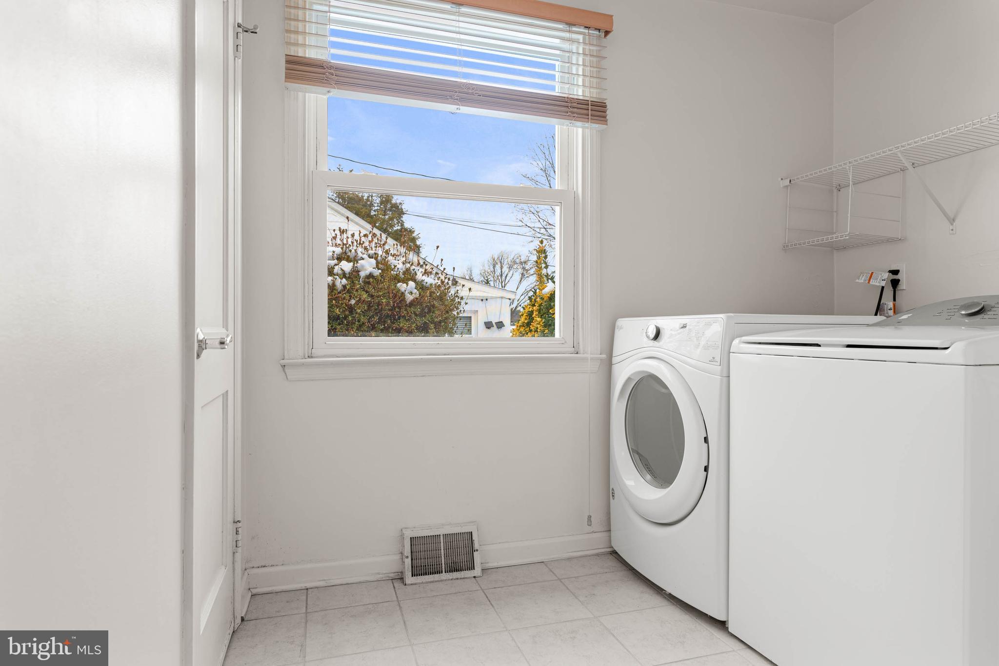 22 Longwood Drive Wayne, PA 19087 - Photo 18 of 28 a utility room with dryer and washer