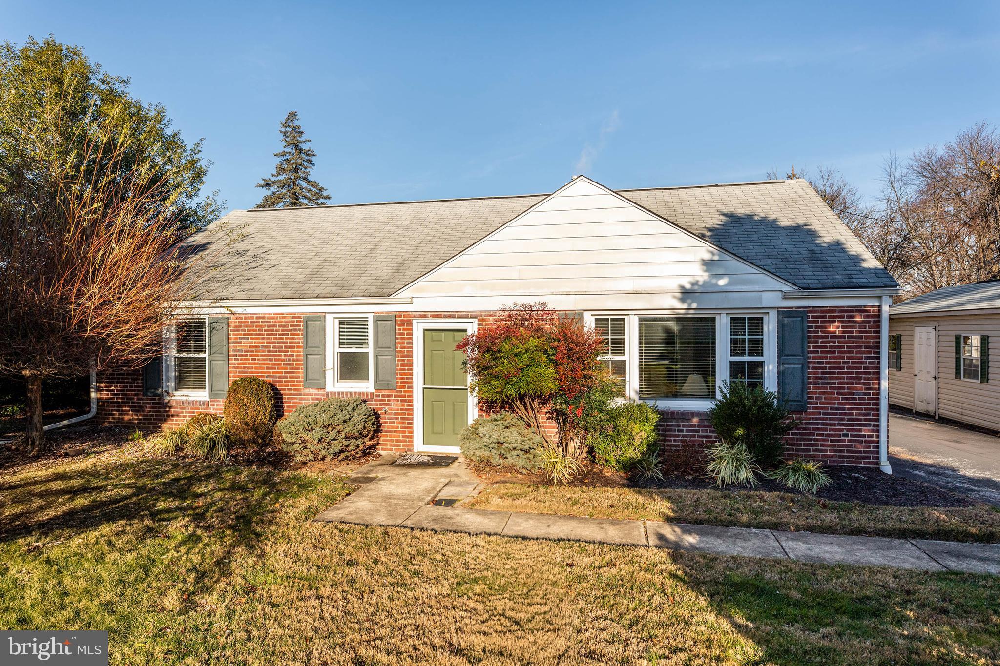 22 Longwood Drive Wayne, PA 19087 - Photo 2 of 28 a front view of a house with a yard