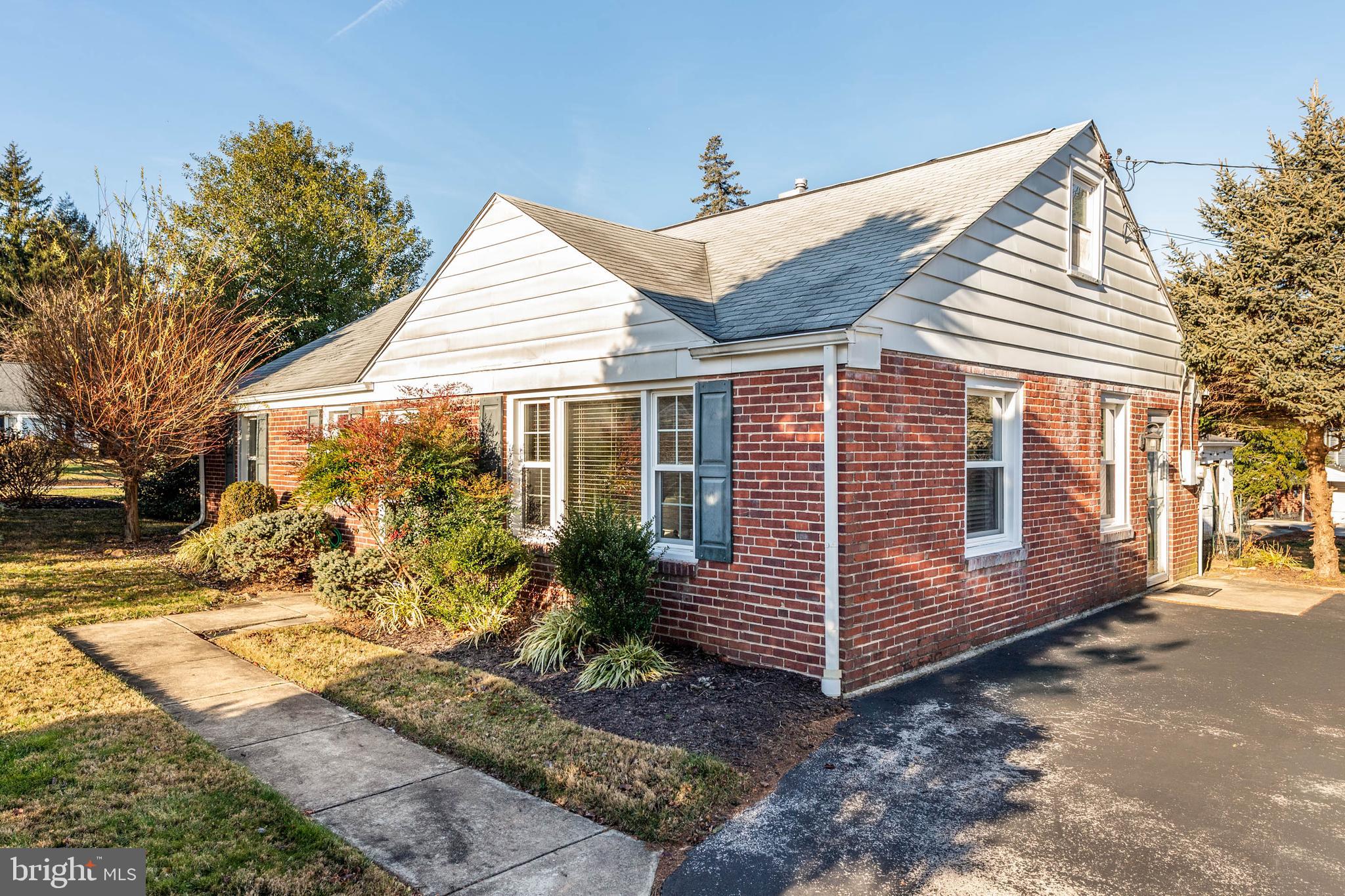 22 Longwood Drive Wayne, PA 19087 - Photo 3 of 28 a view of a house with a yard
