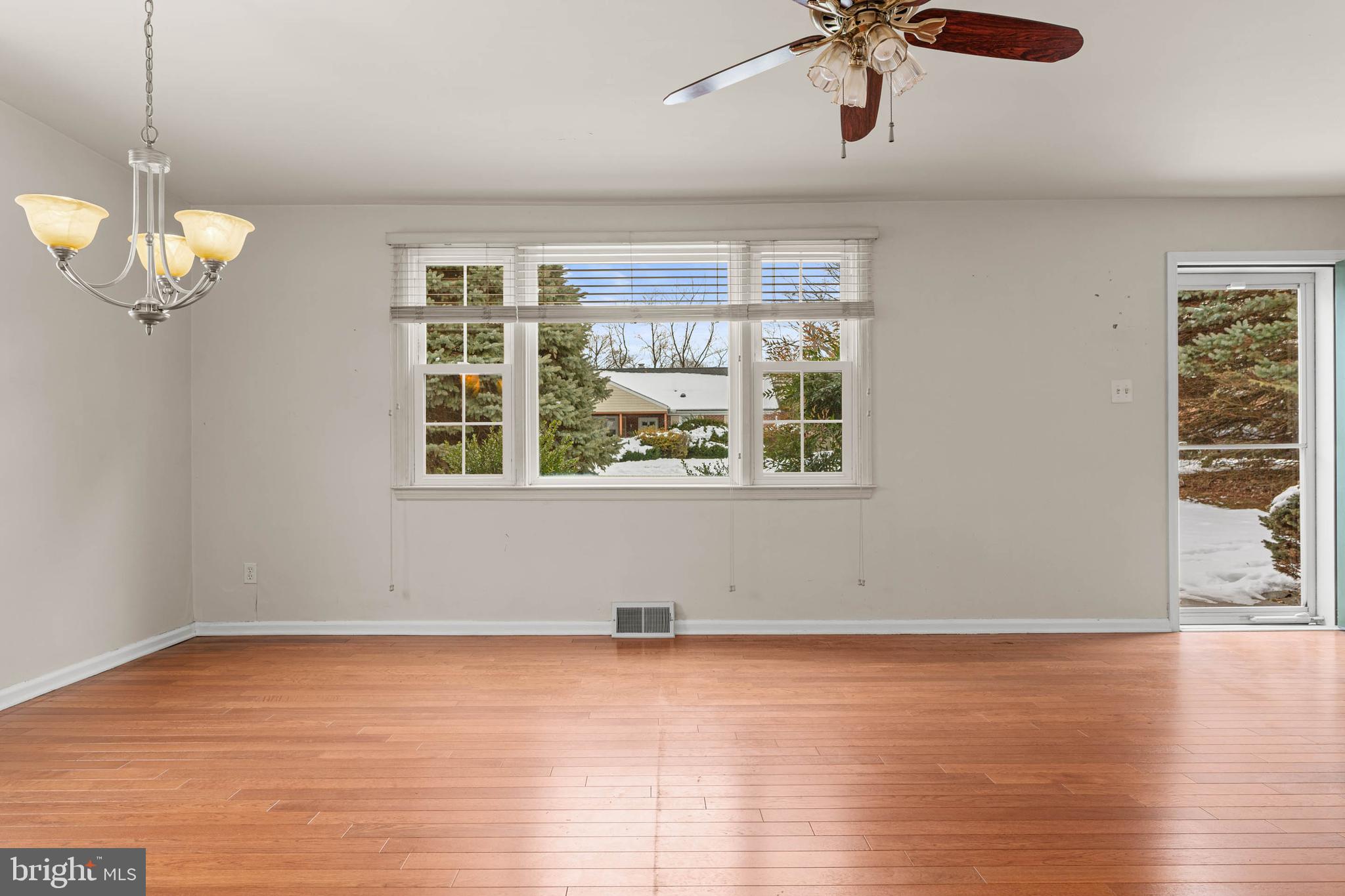 22 Longwood Drive Wayne, PA 19087 - Photo 5 of 28 a view of a room with wooden floor and windows