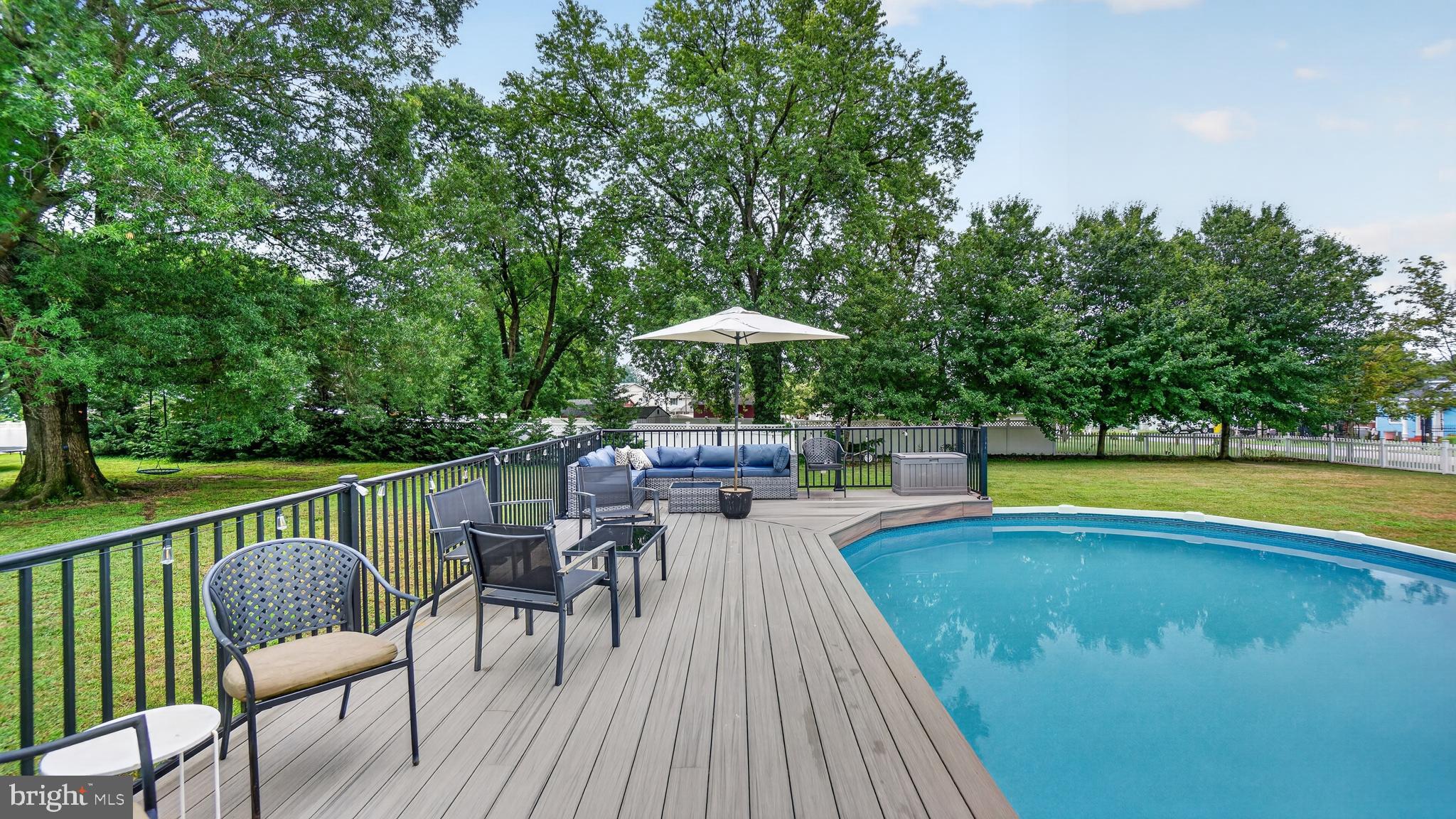7724 Locust Grove Road Glen Burnie, MD 21060 - Photo 64 of 74 Partial Deck Around Pool