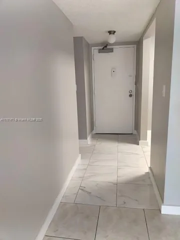 a kitchen with a sink and a window