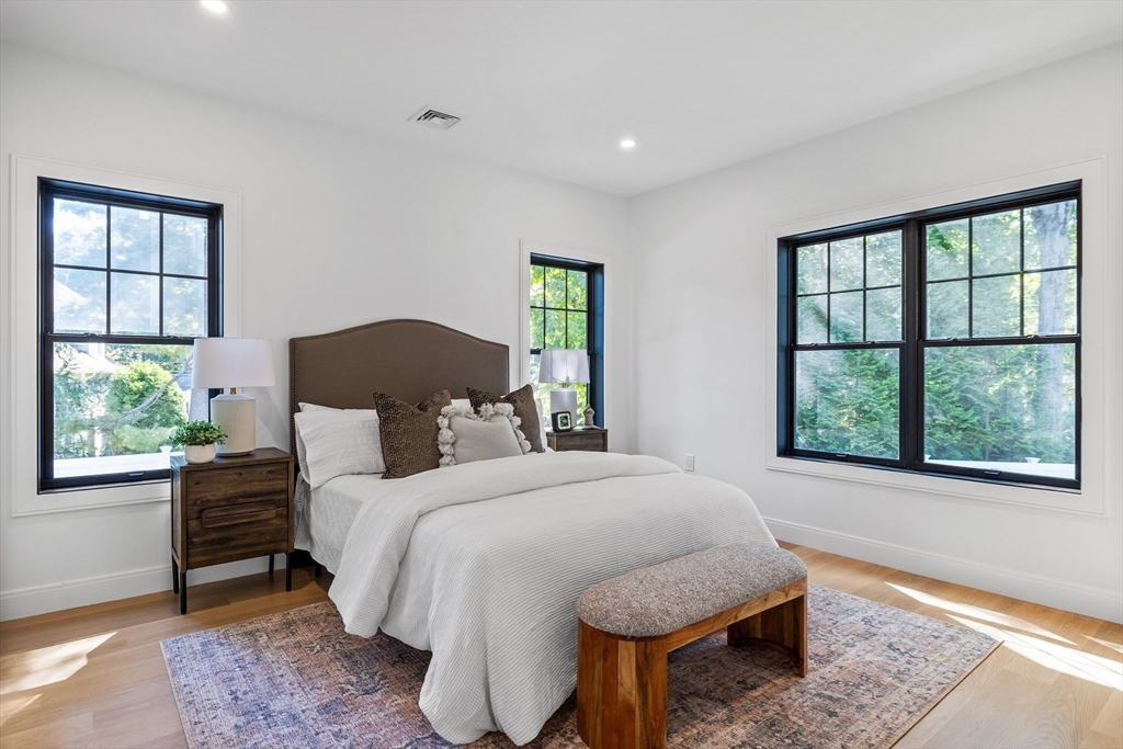 34 Bonwood Road Needham, MA 02492 - Photo 29 of 38 a bedroom with a bed and a window