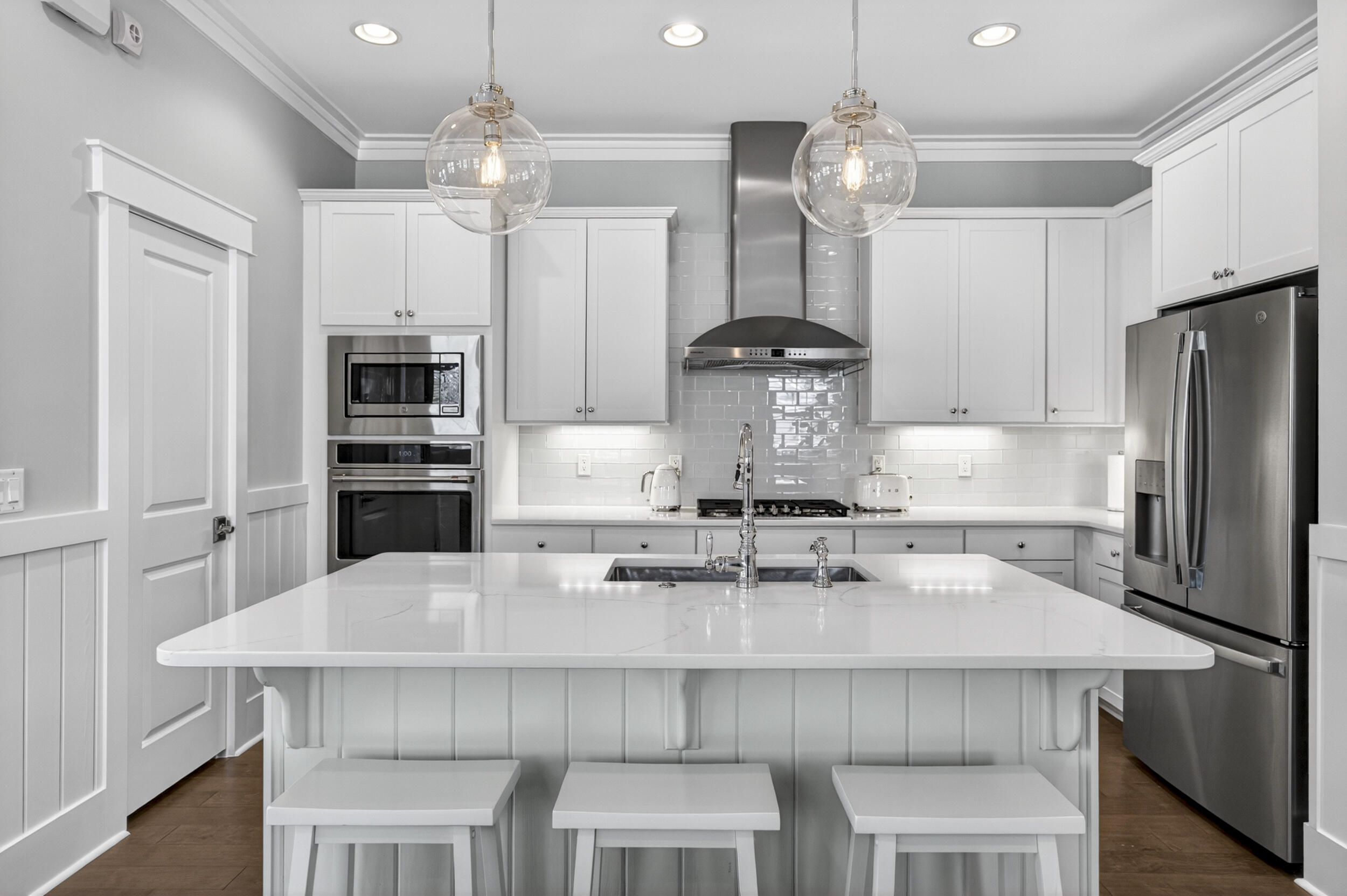 117 Prairie Pass Santa Rosa Beach, FL 32459 - Photo 13 of 56 a kitchen with appliances cabinets and chairs