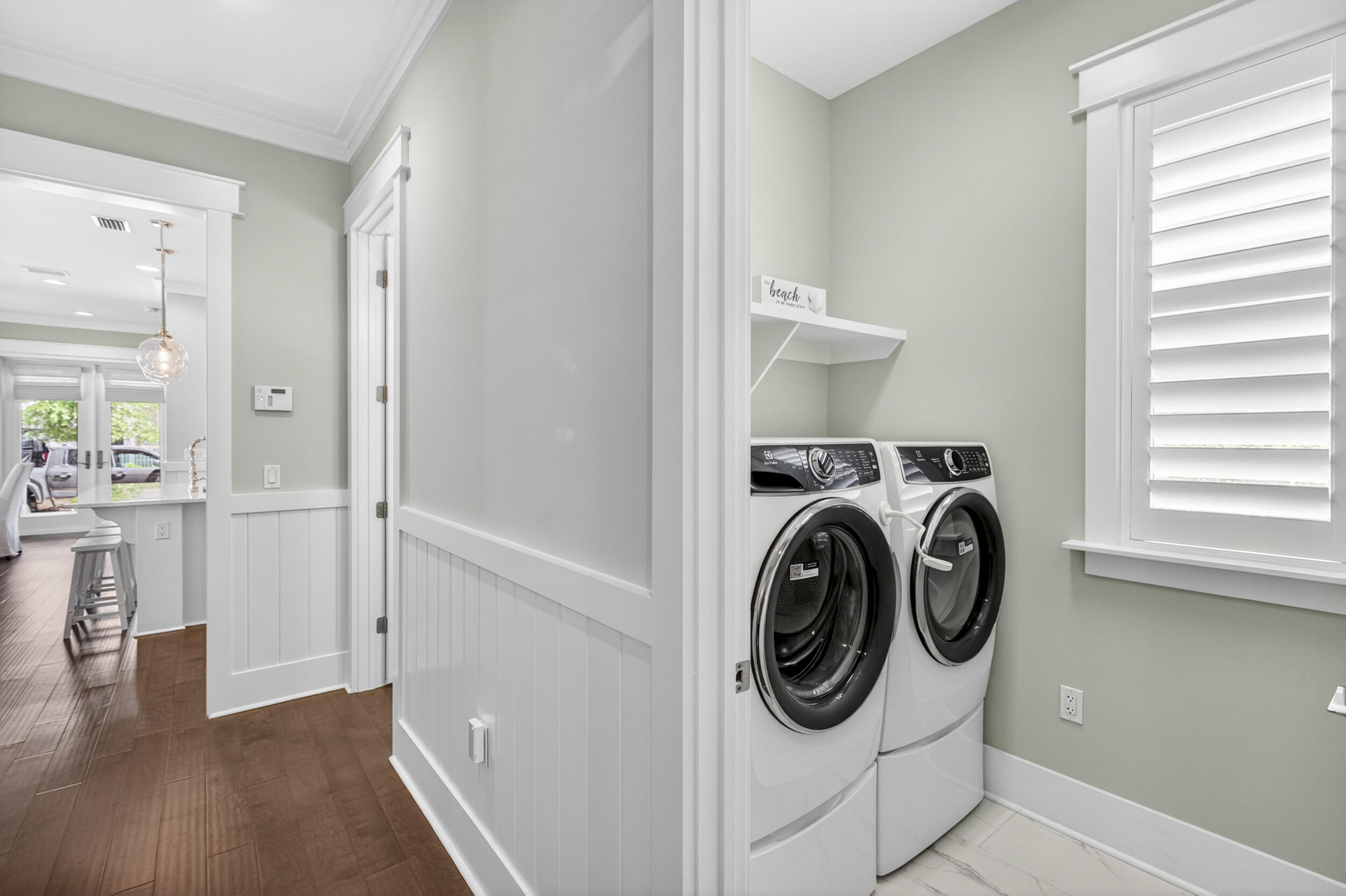 117 Prairie Pass Santa Rosa Beach, FL 32459 - Photo 24 of 56 a utility room with sink dryer and washer