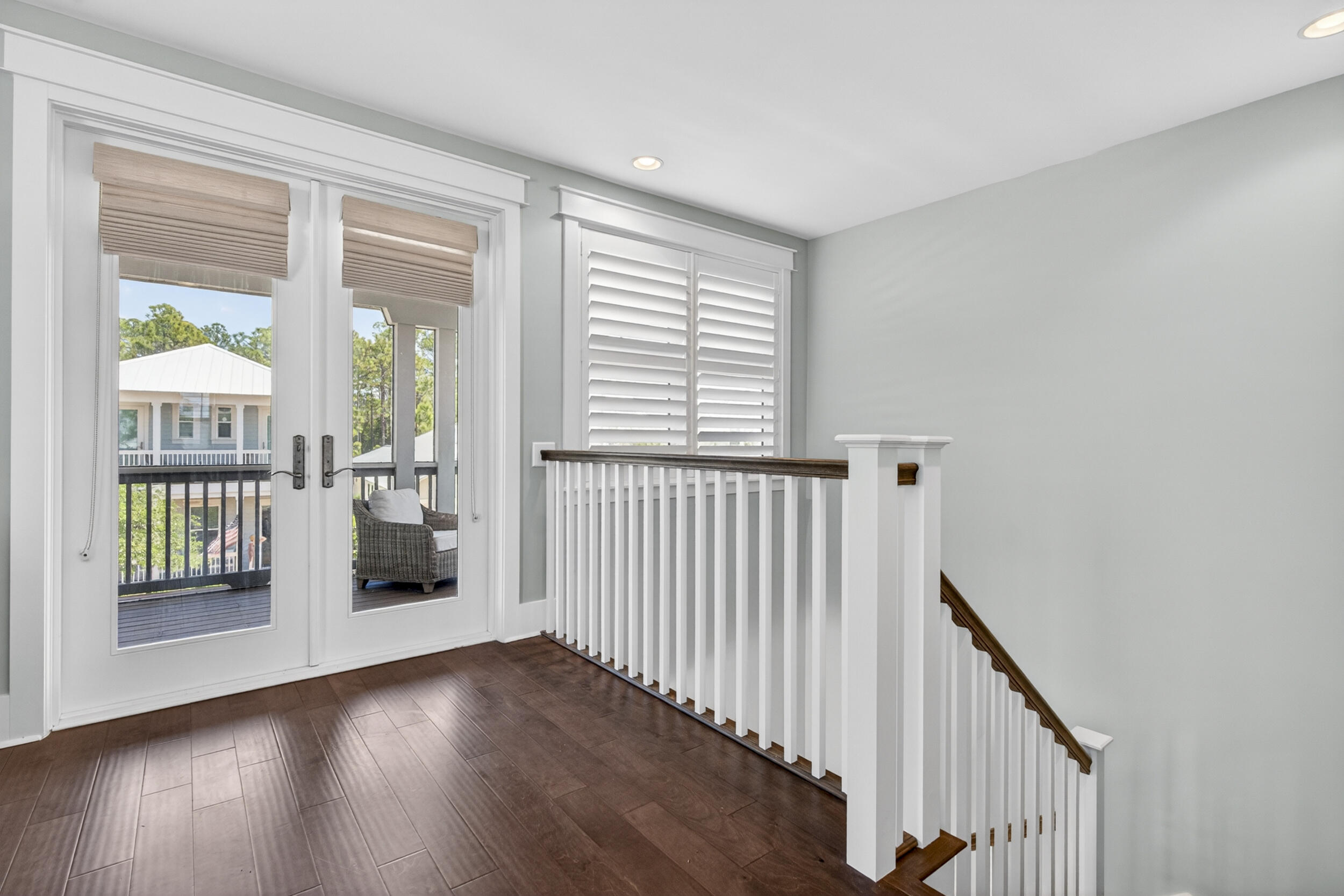 117 Prairie Pass Santa Rosa Beach, FL 32459 - Photo 28 of 56 a view of a hallway with wooden floor and entryway