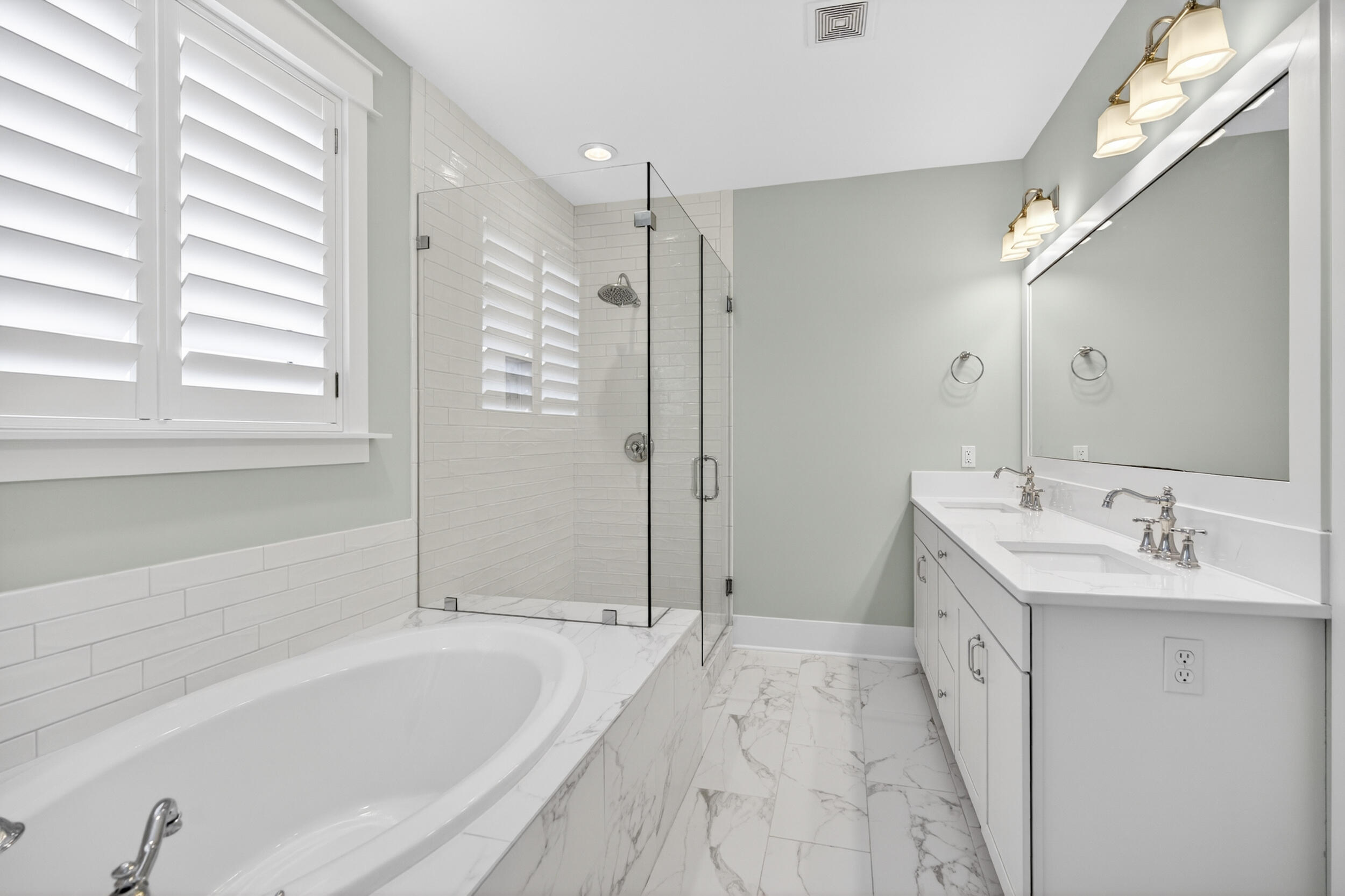 117 Prairie Pass Santa Rosa Beach, FL 32459 - Photo 34 of 56 a bathroom with a tub sink and mirror