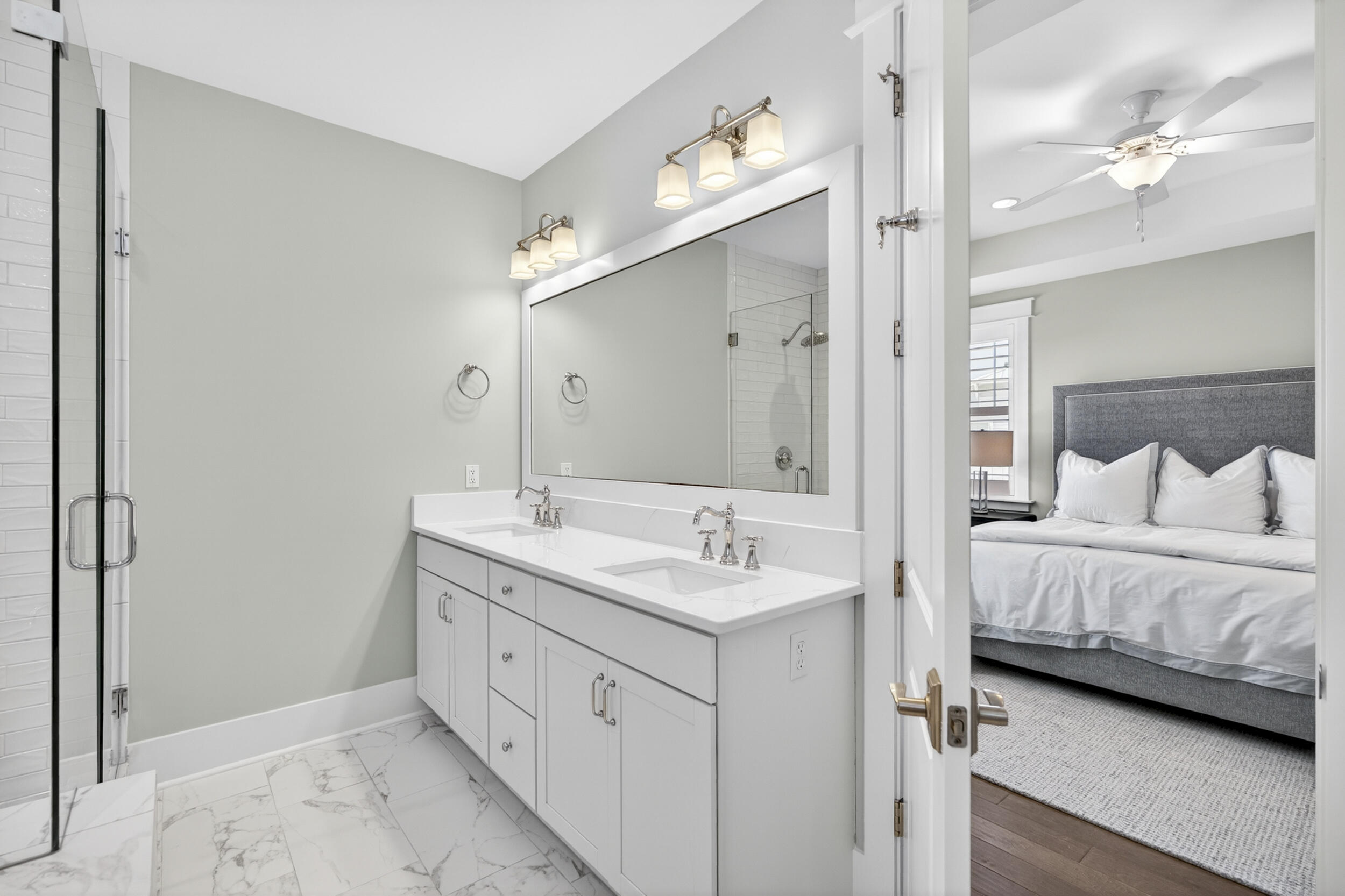 117 Prairie Pass Santa Rosa Beach, FL 32459 - Photo 35 of 56 a spacious bathroom with a double vanity sink and a mirror