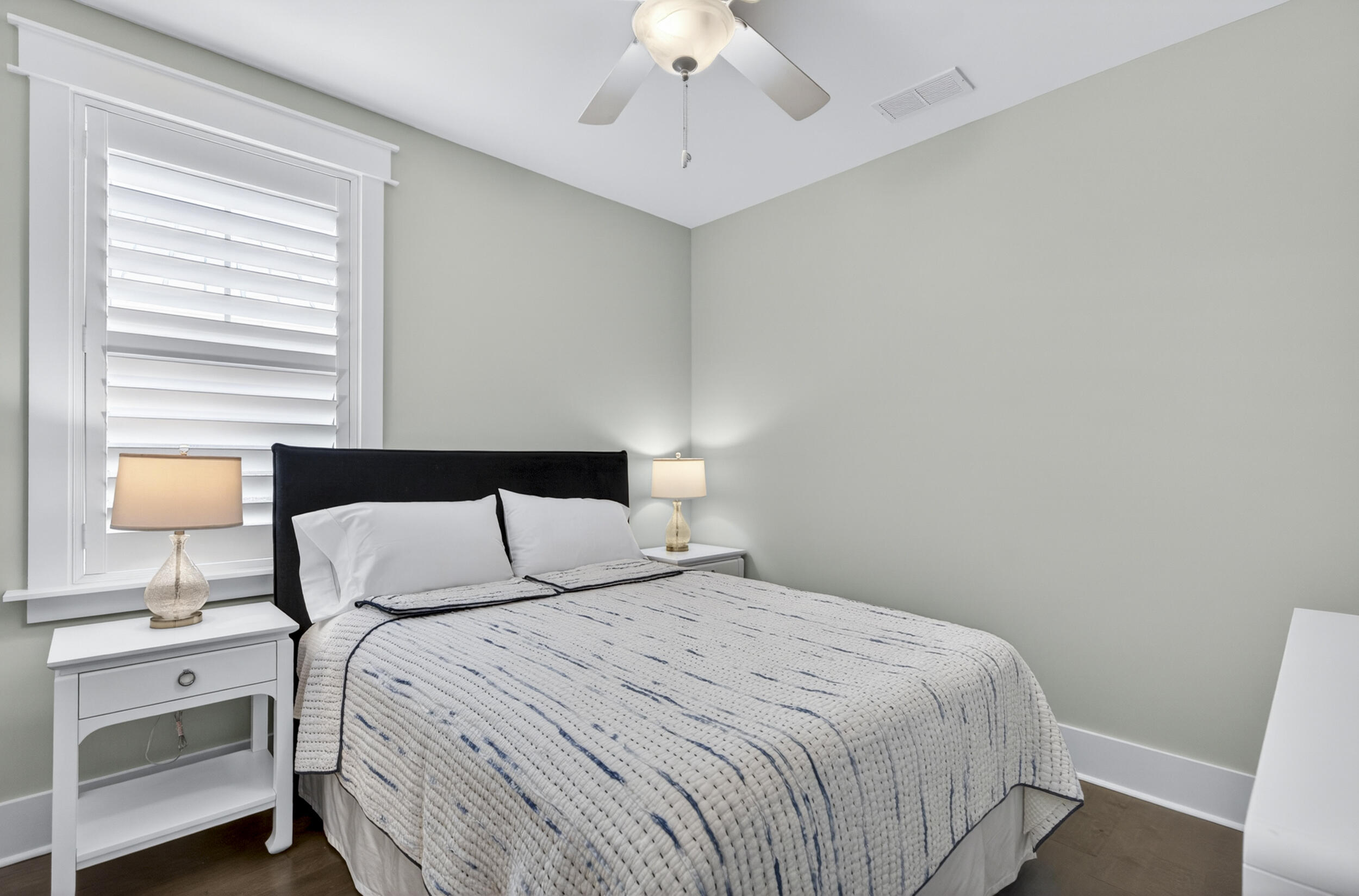 117 Prairie Pass Santa Rosa Beach, FL 32459 - Photo 37 of 56 a bedroom with a bed and a lamp