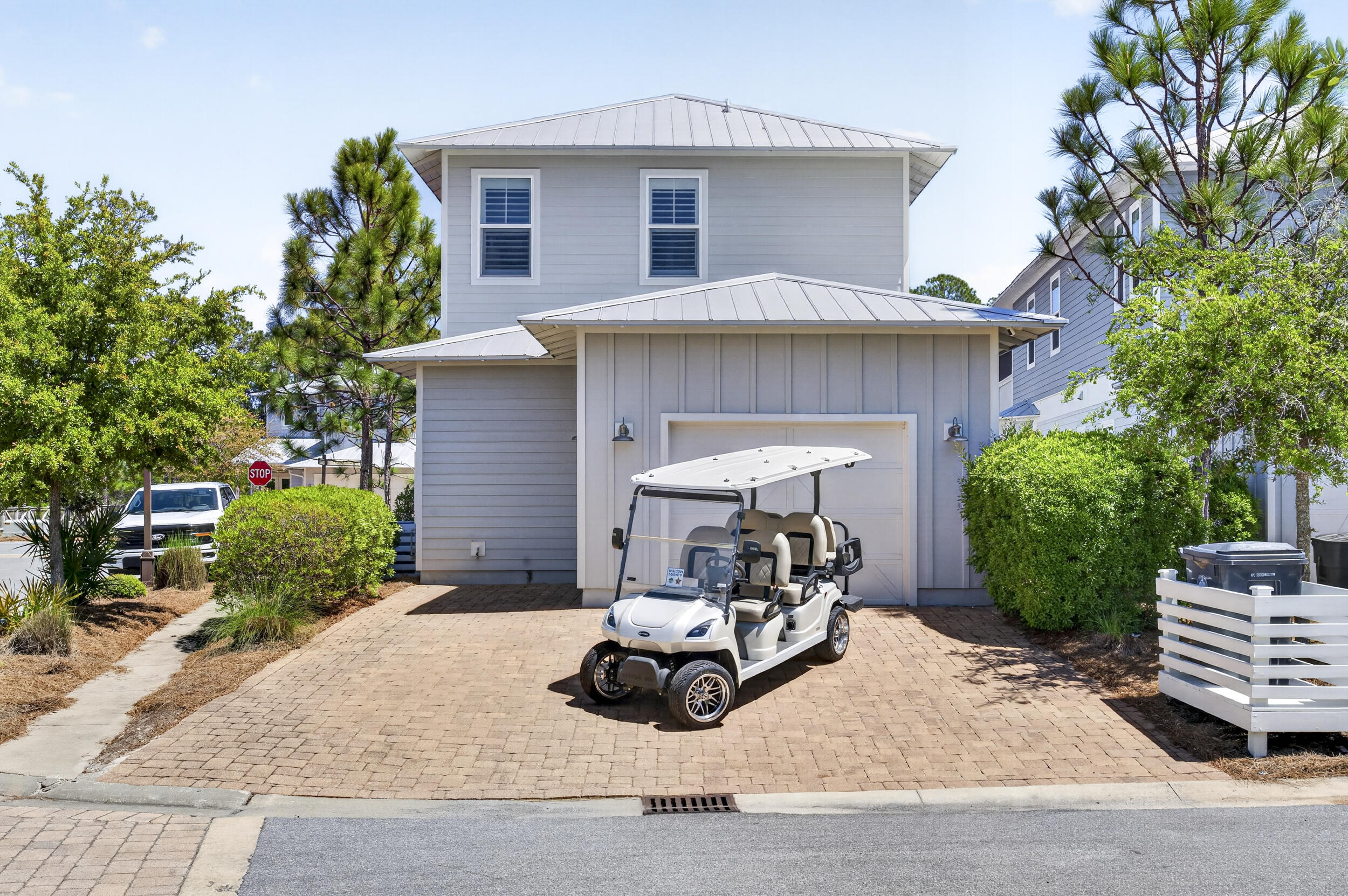 117 Prairie Pass Santa Rosa Beach, FL 32459 - Photo 42 of 56 a view of a chair and tables in the patio of the house