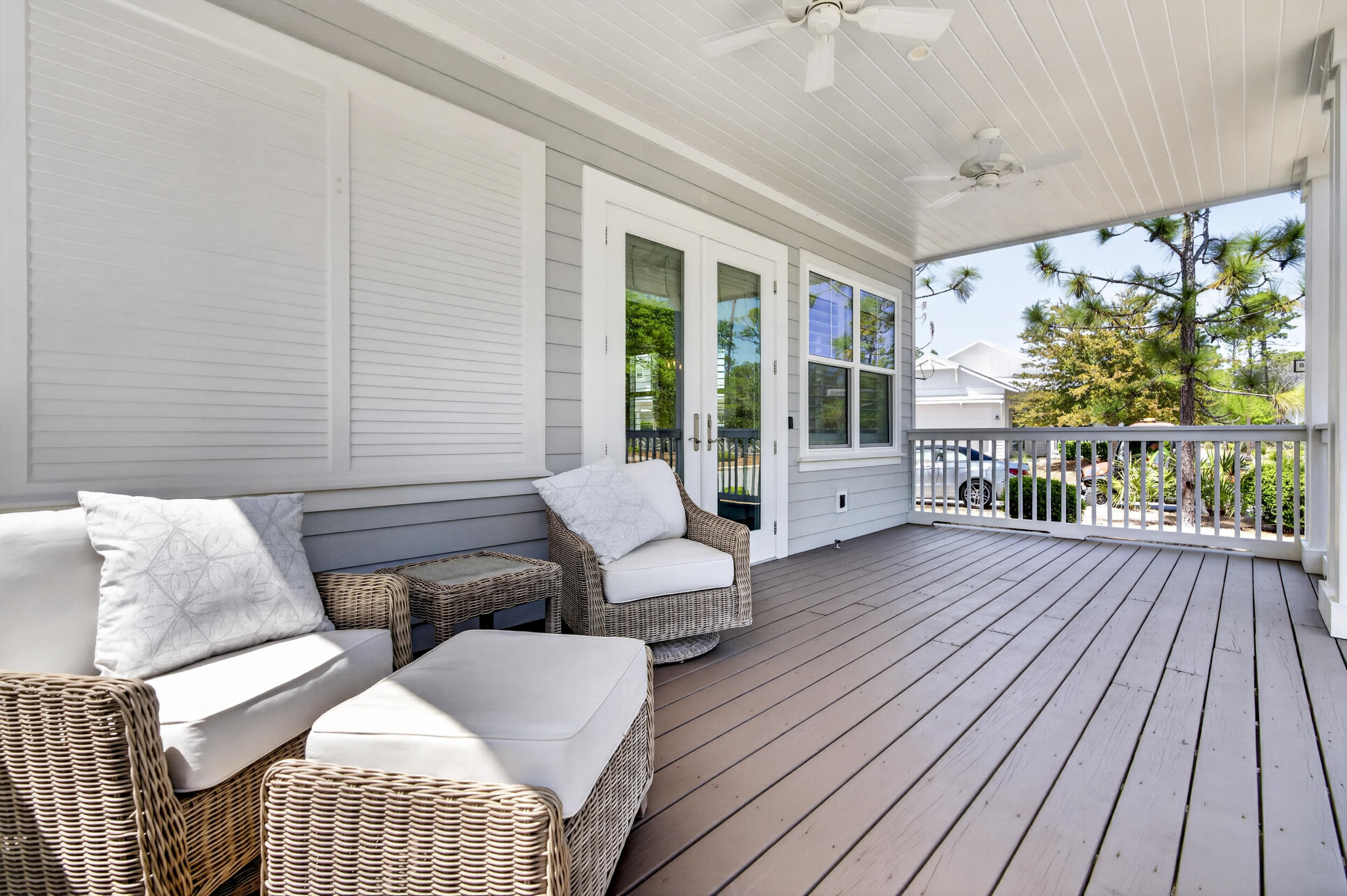 117 Prairie Pass Santa Rosa Beach, FL 32459 - Photo 5 of 56 a balcony with wooden floor and glass door