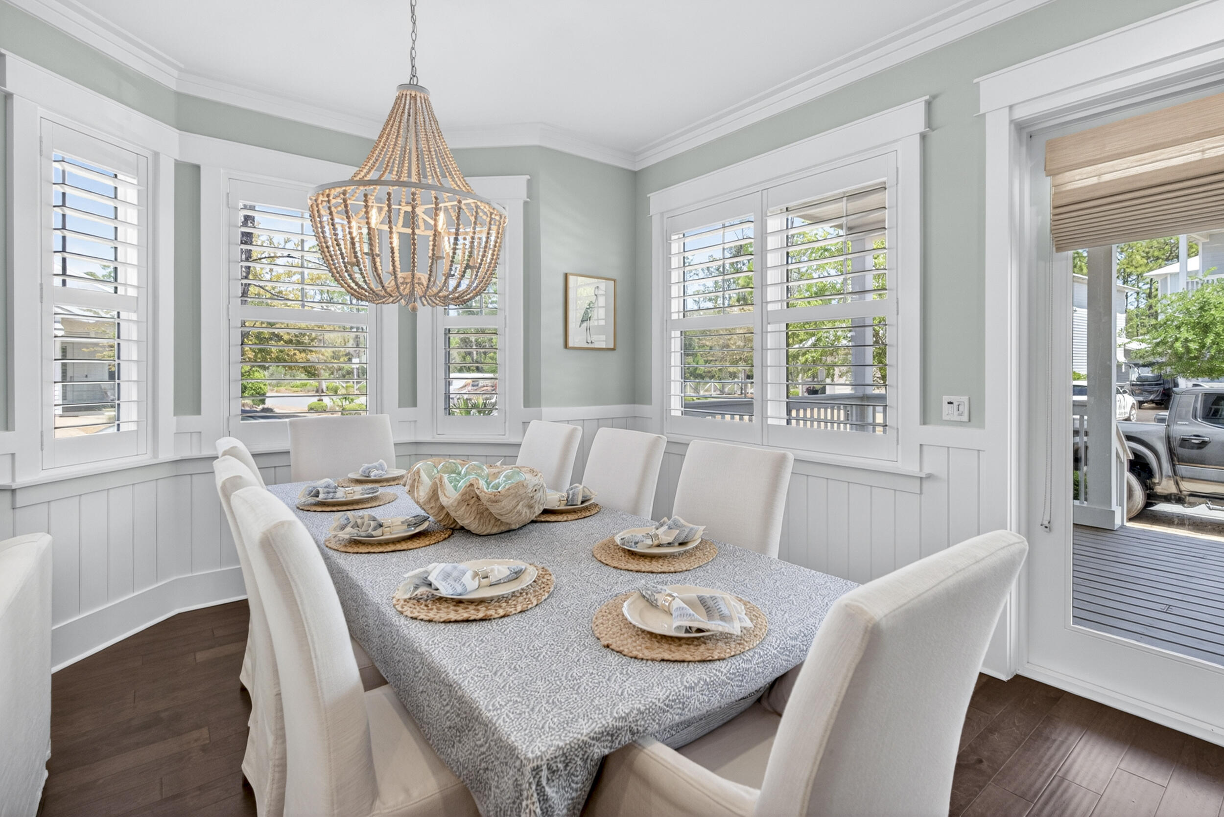 117 Prairie Pass Santa Rosa Beach, FL 32459 - Photo 8 of 56 a view of a dining room with furniture wooden floor and chandelier
