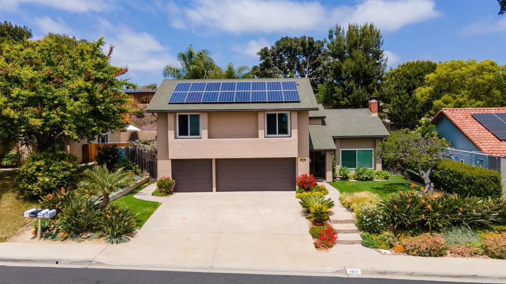 1462 Pegaso Street Encinitas, CA 92024 - Photo 2 of 36 a front view of a house with a yard