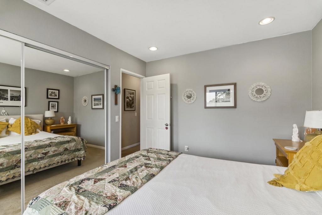 1462 Pegaso Street Encinitas, CA 92024 - Photo 26 of 36 a bedroom with double bed and a window