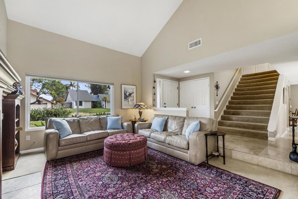 1462 Pegaso Street Encinitas, CA 92024 - Photo 32 of 36 a living room with furniture and a couch