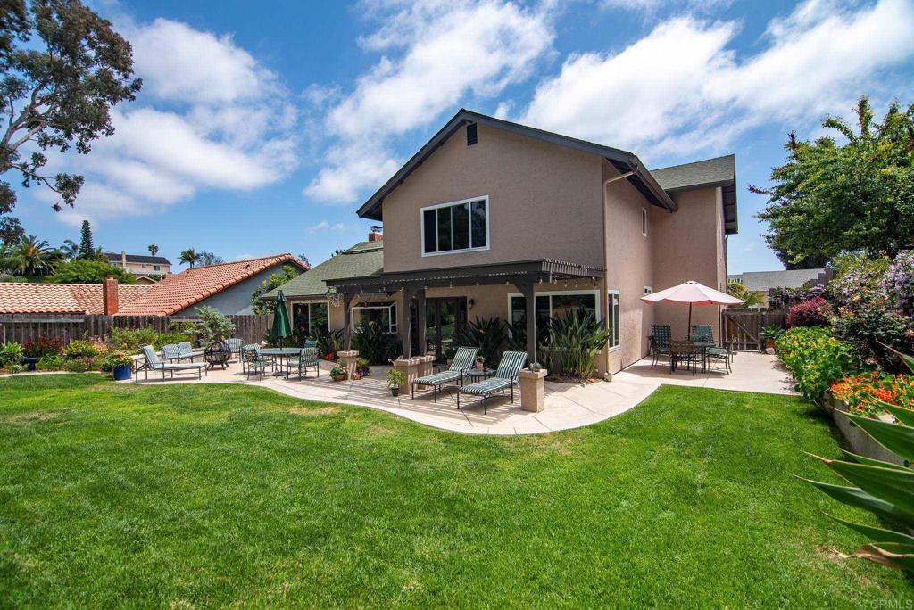 1462 Pegaso Street Encinitas, CA 92024 - Photo 8 of 36 a view of a house with backyard and sitting area