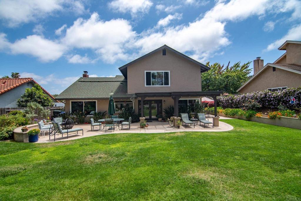 1462 Pegaso Street Encinitas, CA 92024 - Photo 9 of 36 a front view of house with yard and outdoor seating