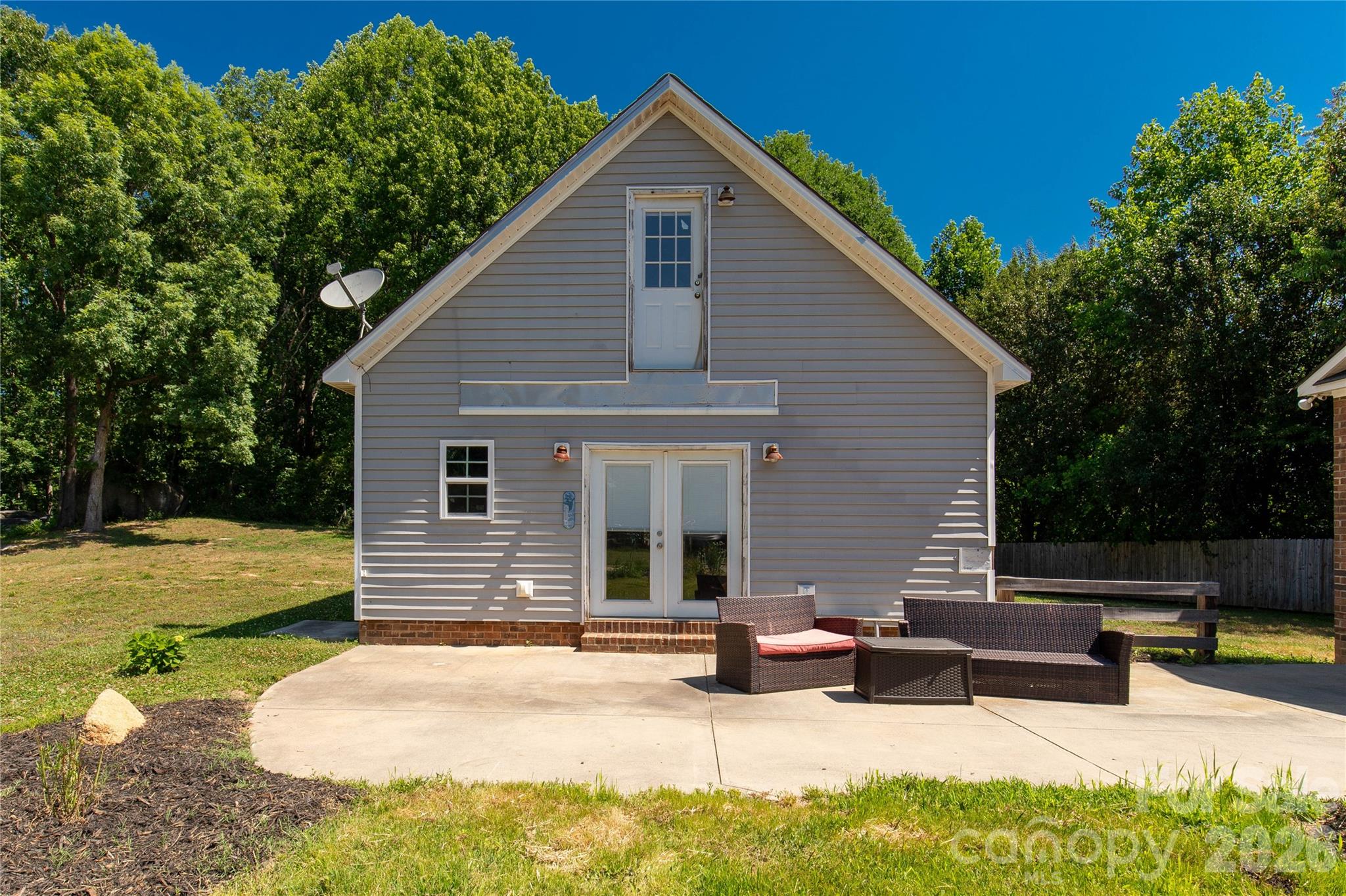 1845 State Rd S-46-149 Clover, SC 29710 - Photo 21 of 28 a view of a backyard with a sitting area