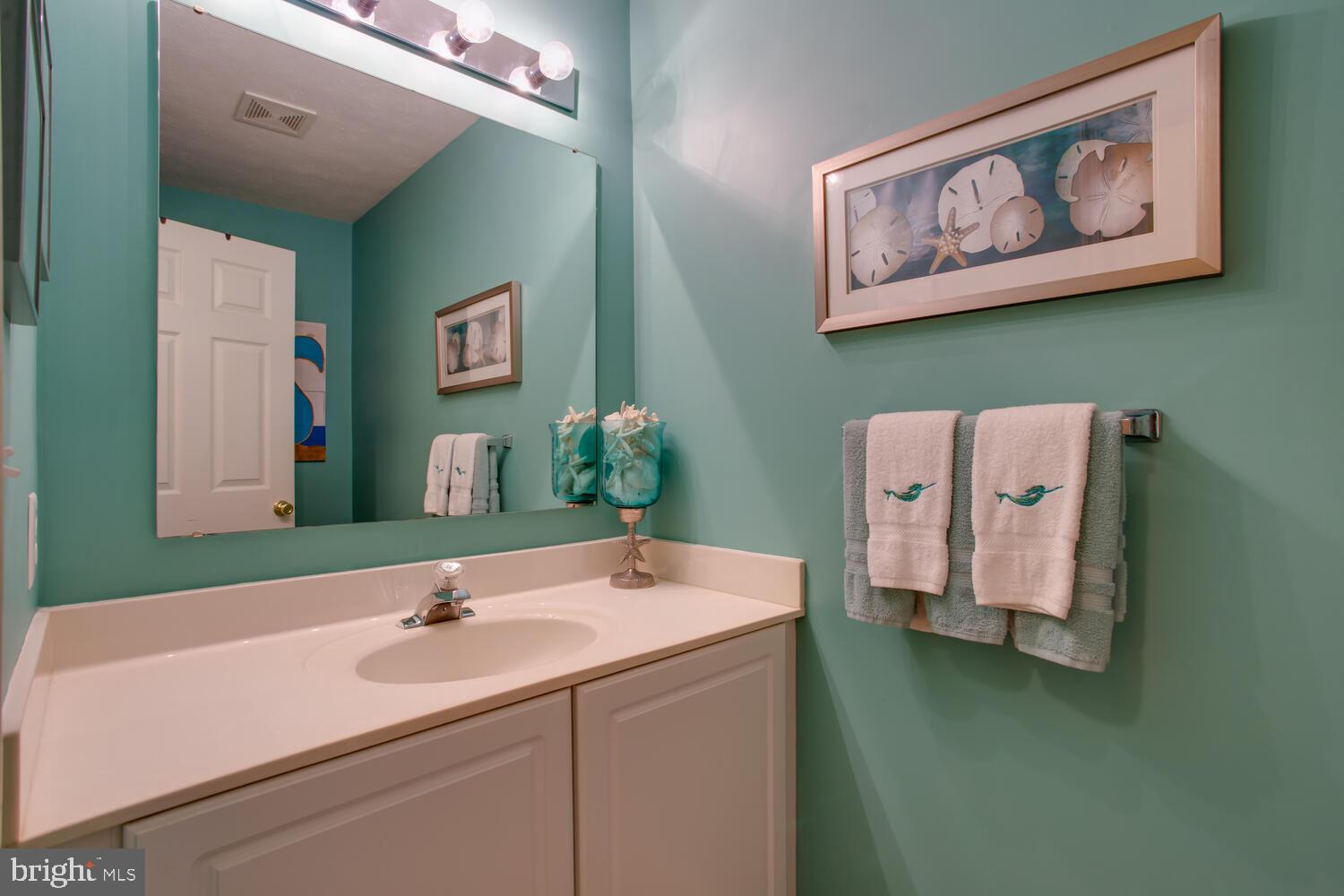 16188 Calvert Creek Lane Ridge, MD 20680 - Photo 17 of 37 Powder room main floor