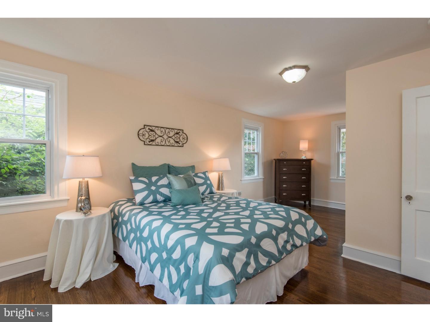 408 Lenox Road Havertown, PA 19083 - Photo 13 of 25 a bedroom with a large bed and a large window