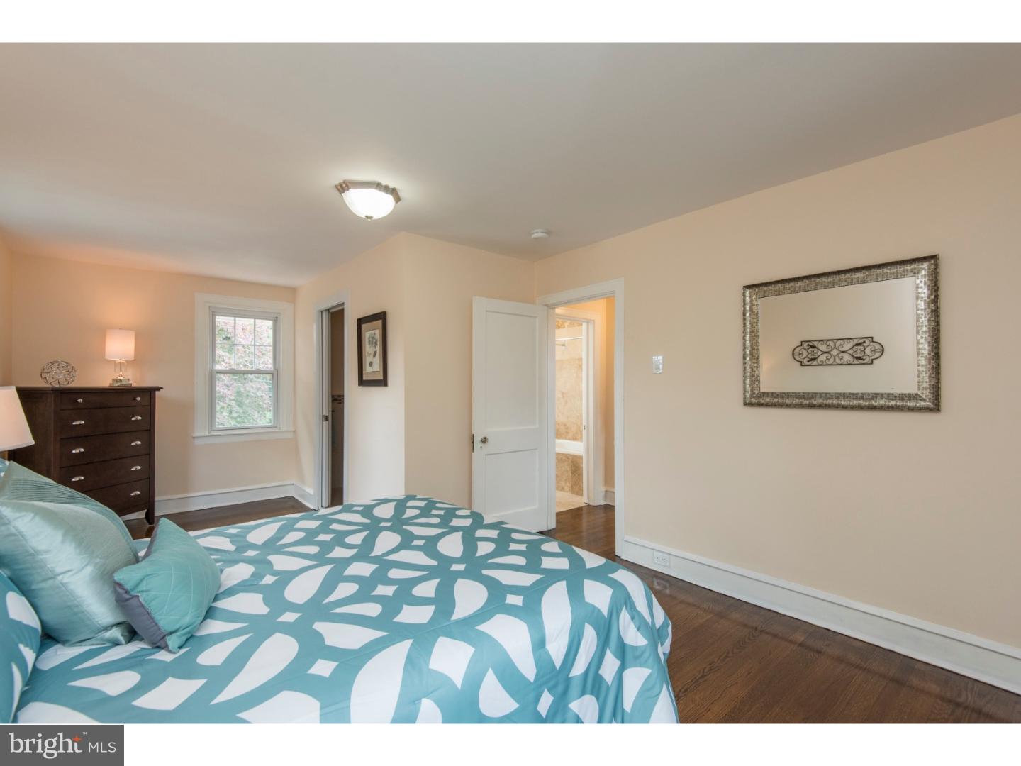 408 Lenox Road Havertown, PA 19083 - Photo 14 of 25 a bedroom with a bed and painting on the wall