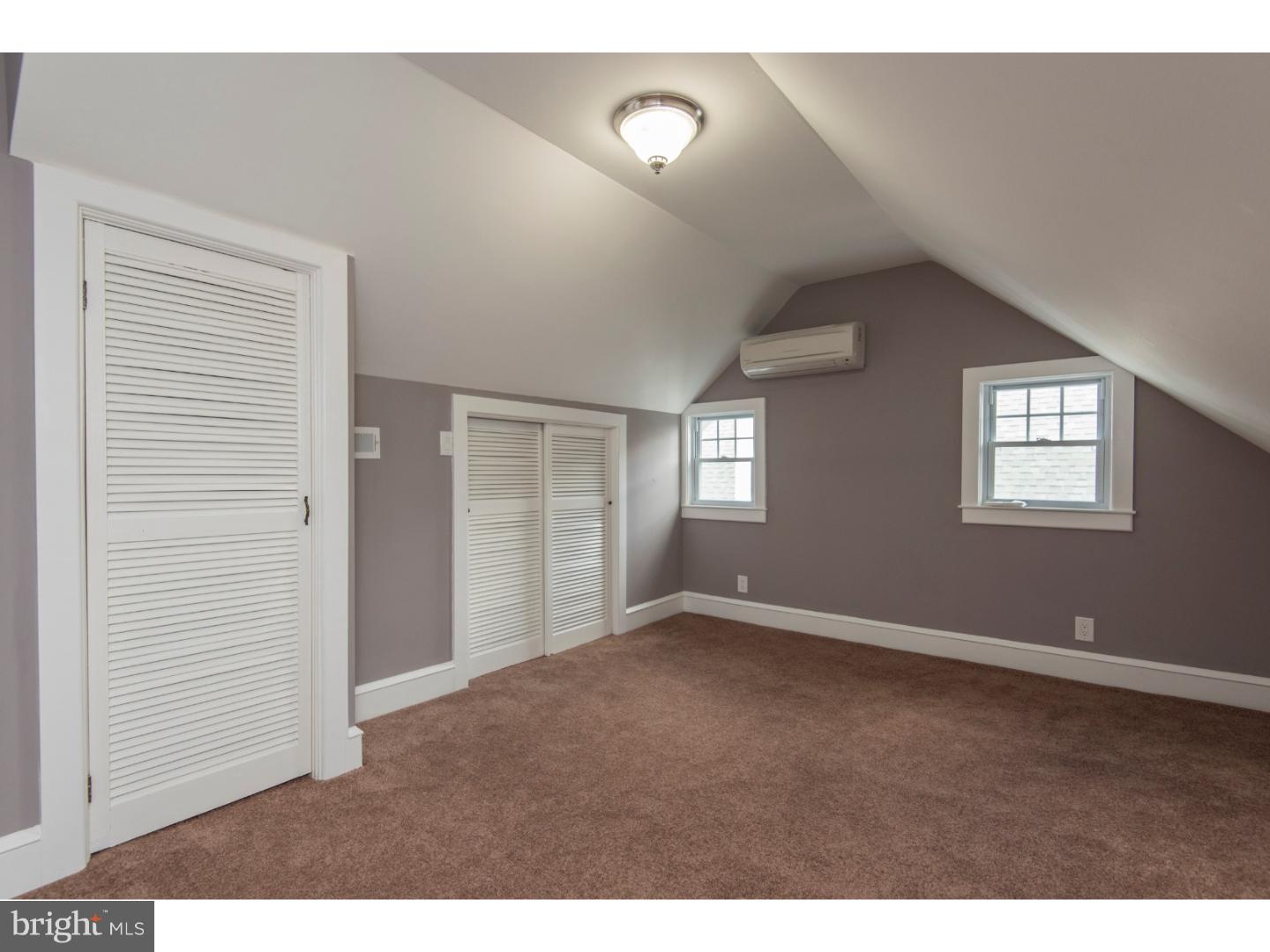 408 Lenox Road Havertown, PA 19083 - Photo 18 of 25 a view of an empty room with a window