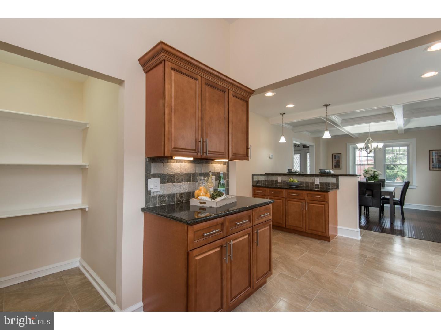 408 Lenox Road Havertown, PA 19083 - Photo 10 of 25 a kitchen with stainless steel appliances granite countertop a sink and cabinets
