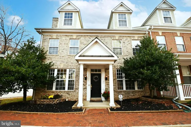 front view of a house with a small yard